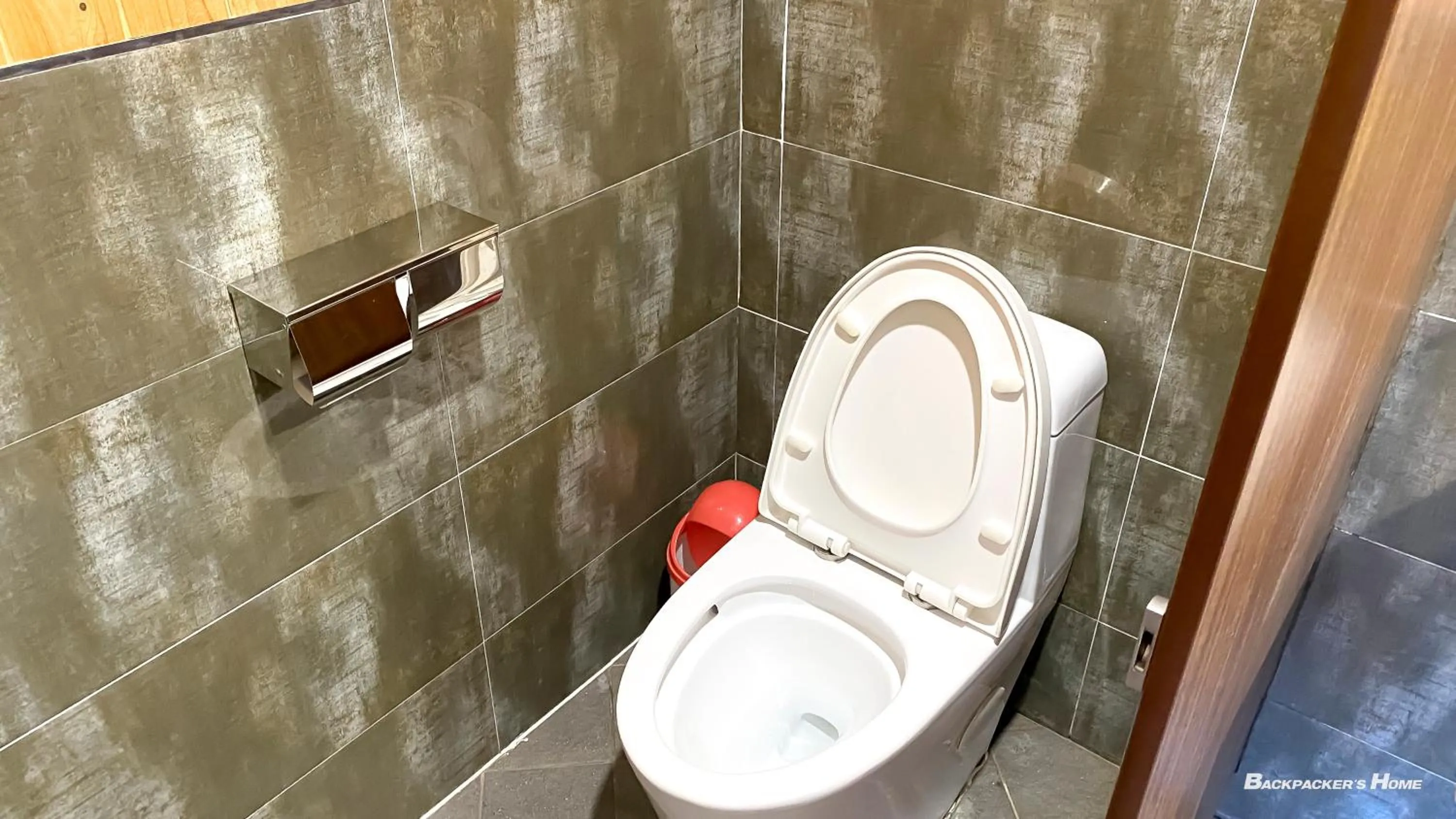 Toilet in Backpacker's Home