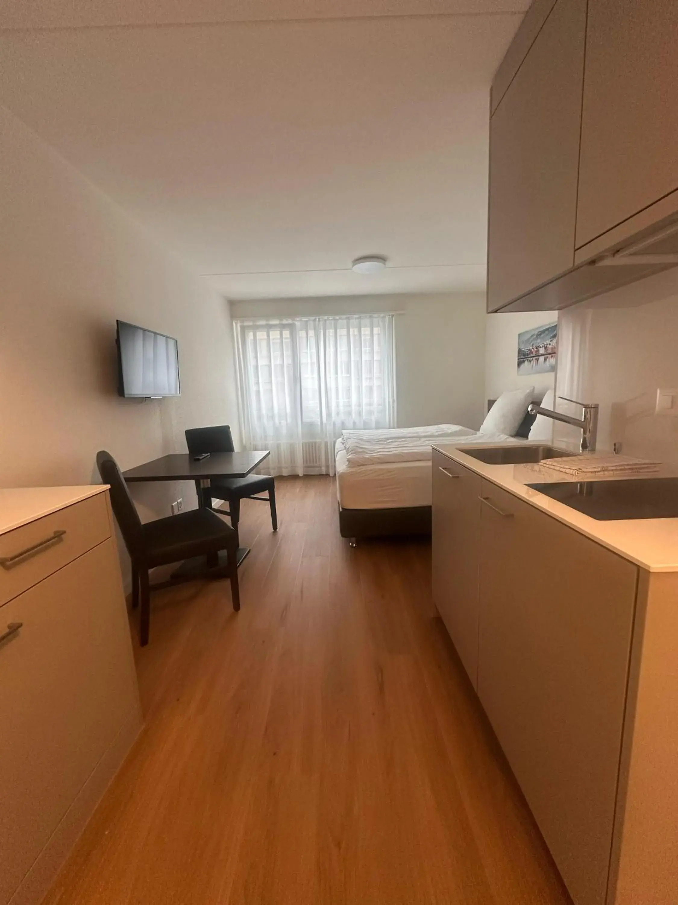 Kitchen or kitchenette in Swiss Star Zurich Airport - Self Check-In Kitchen or kitchenette in Swiss Star Zurich Airport - Self Check-In