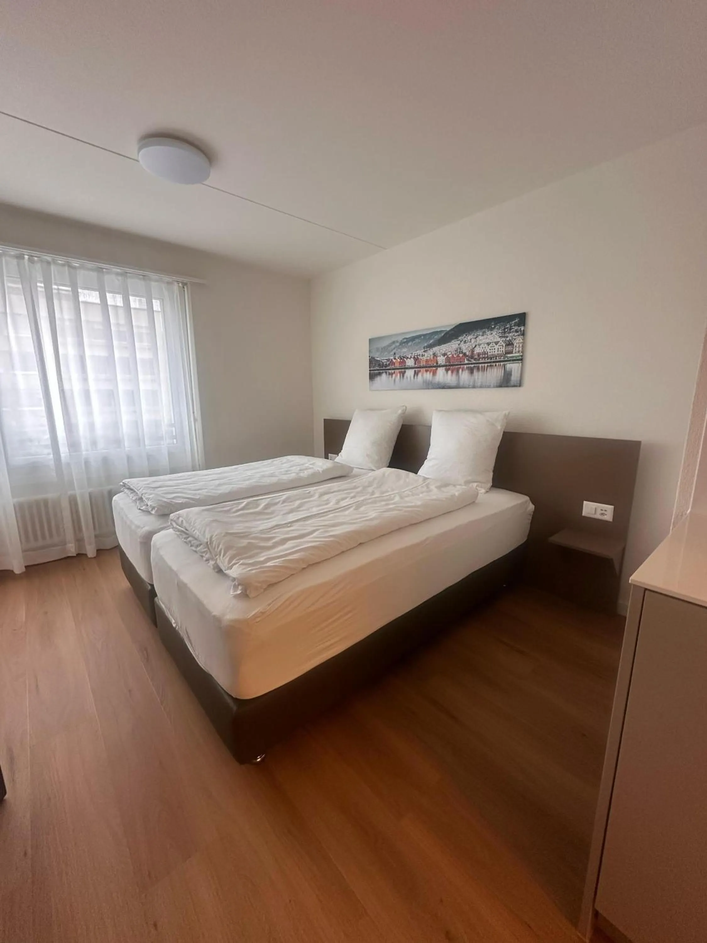 Photo of the whole room, Bed in Swiss Star Zurich Airport - Self Check-In