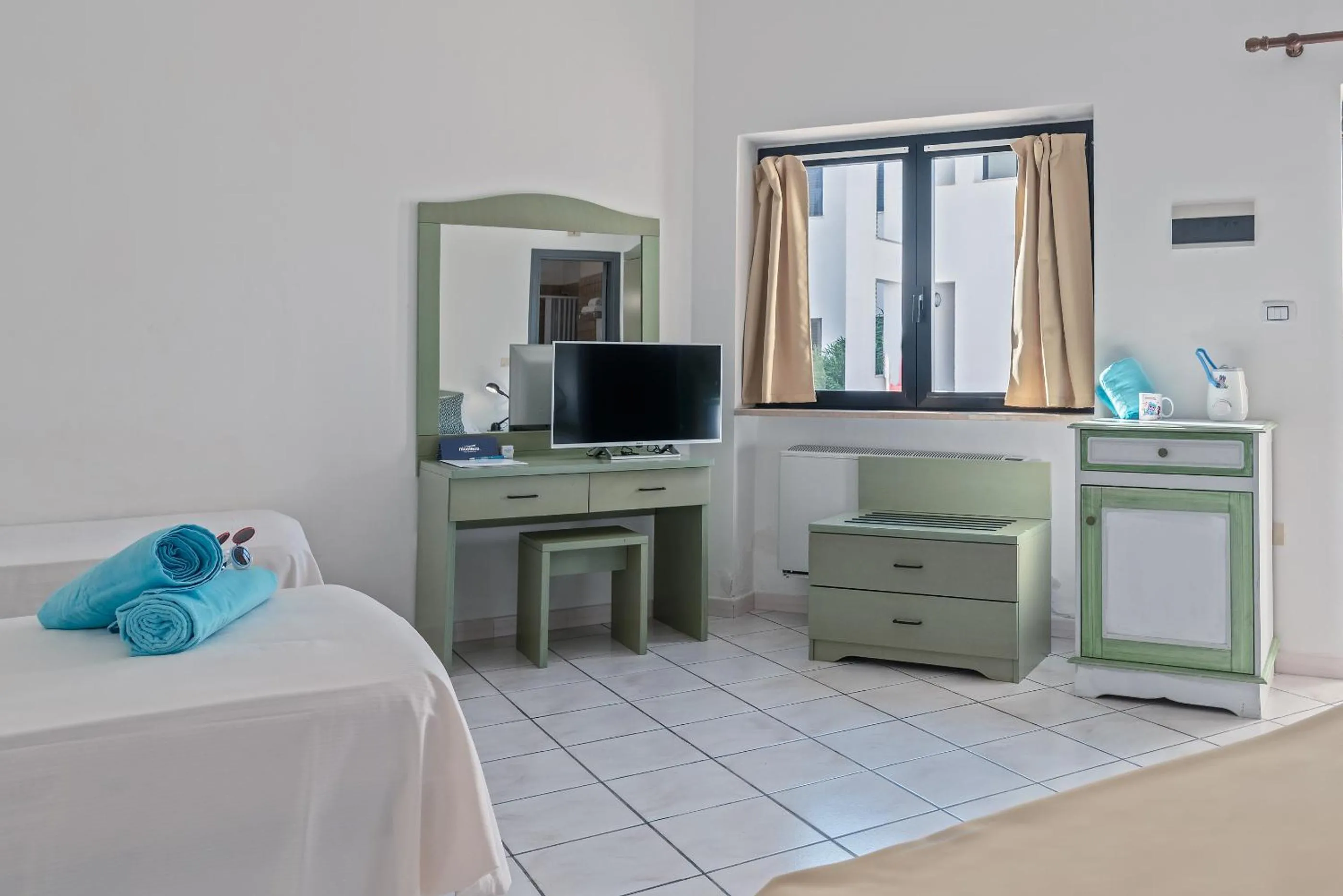 Photo of the whole room, Bed in Nicolaus Club Bagamoyo Resort