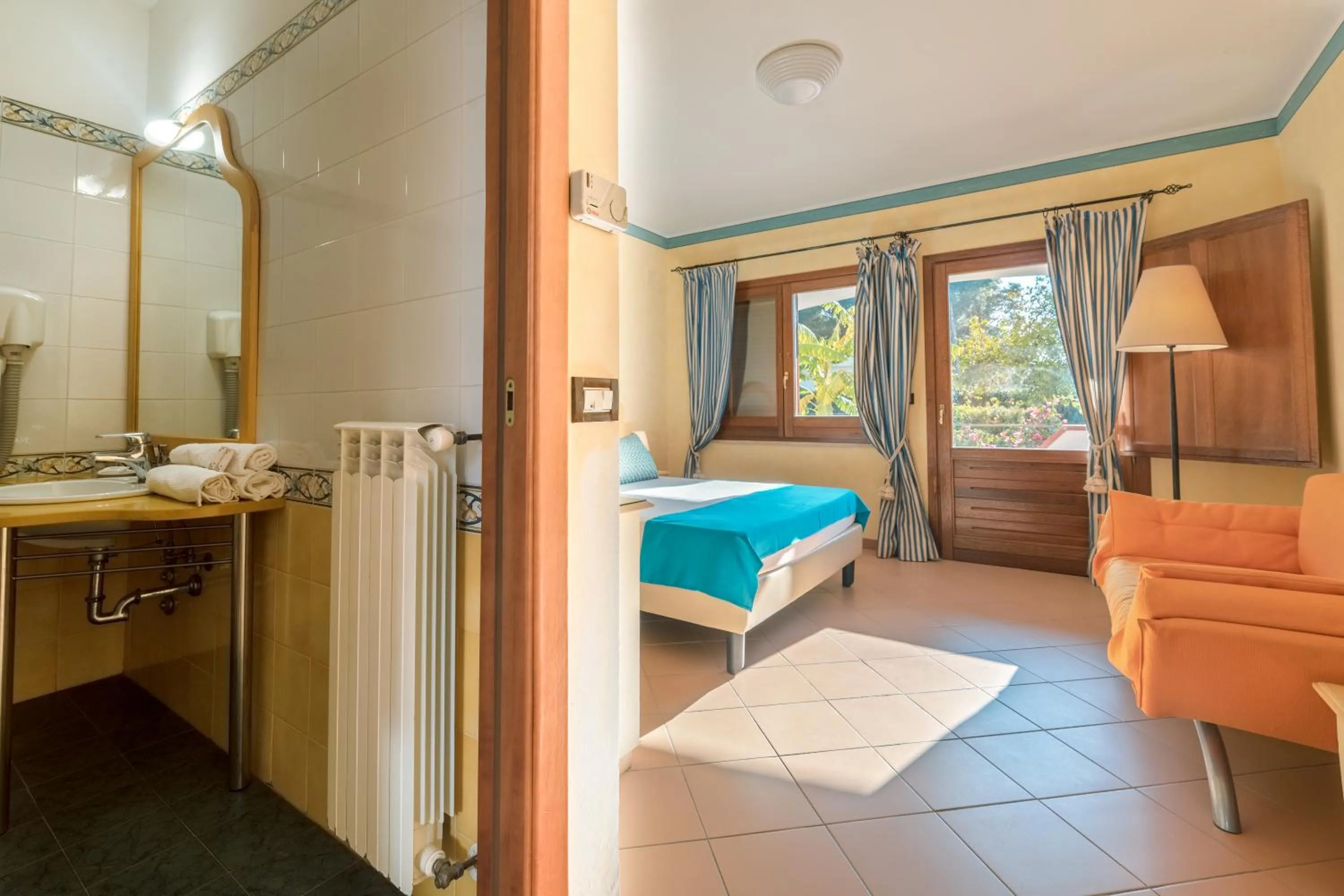 Bed in Nicolaus Club Bagamoyo Resort
