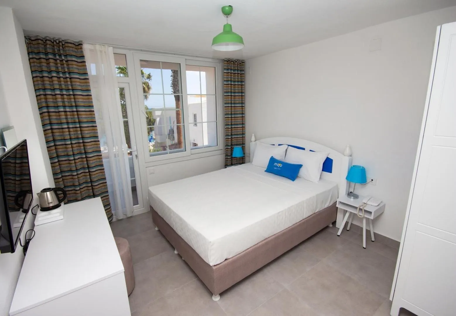 Bed in MOJO OTEL BEACH