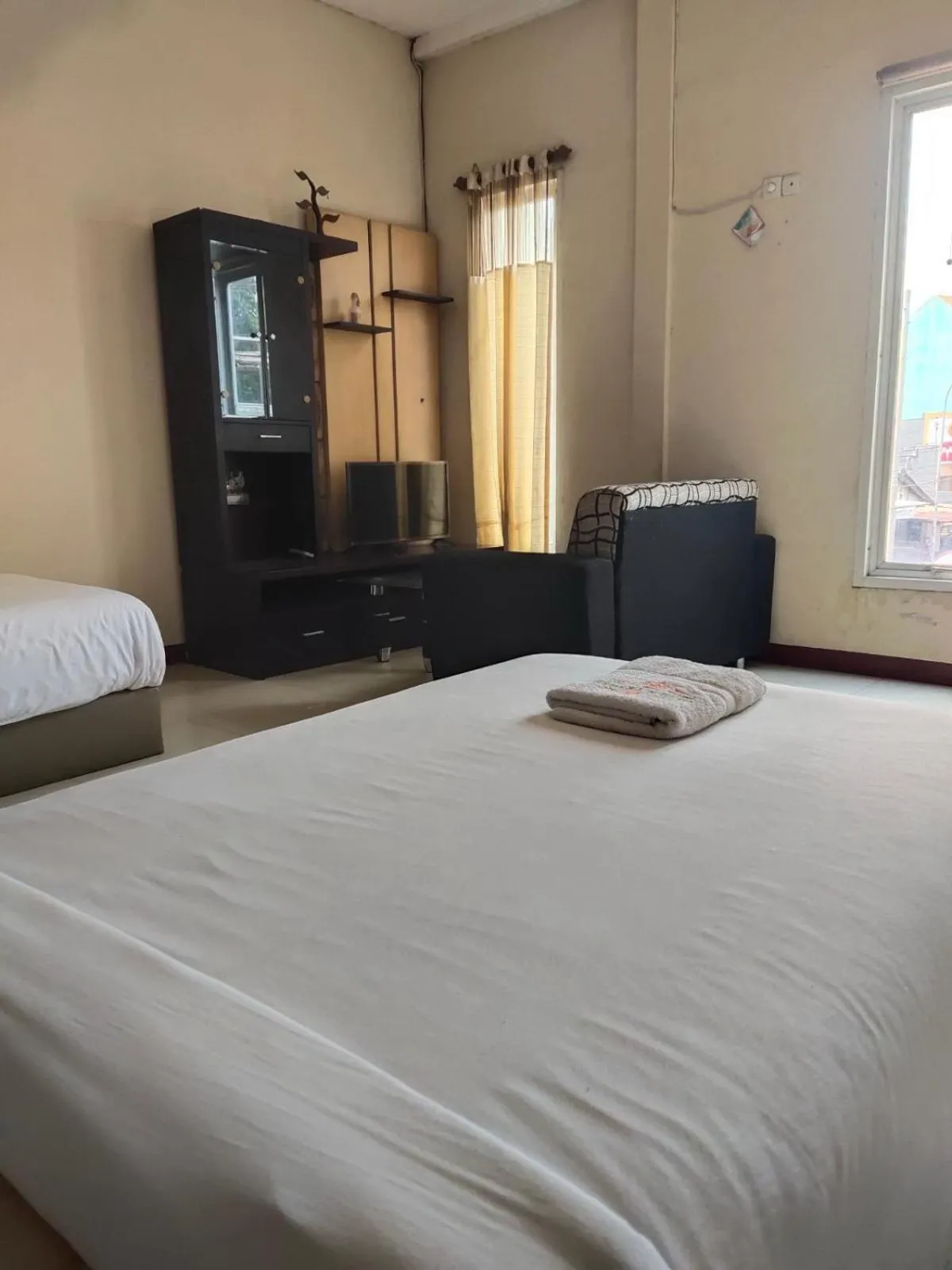 Bed in Mojokerto Classic Homestay