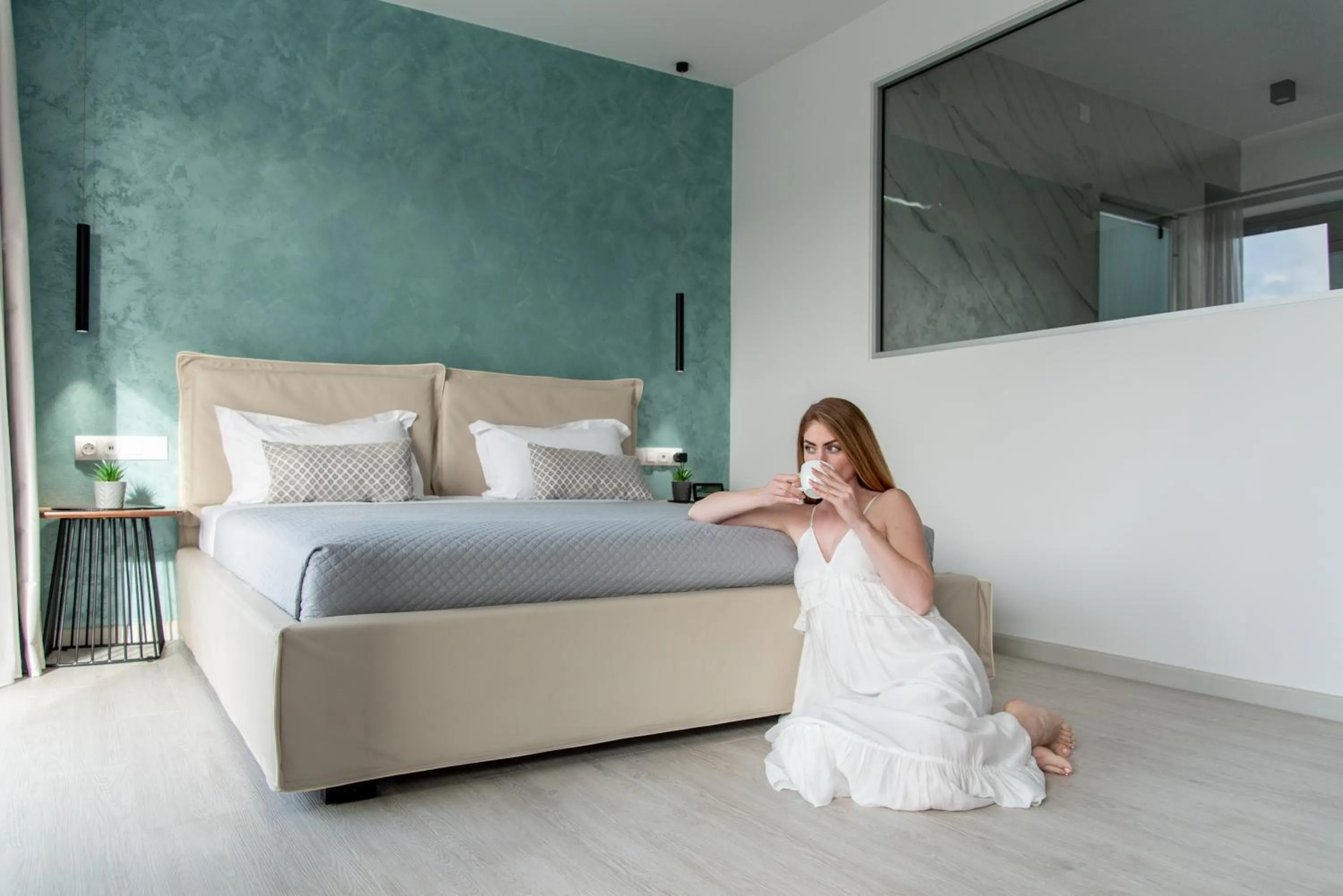 Bed in xSuites Hotel