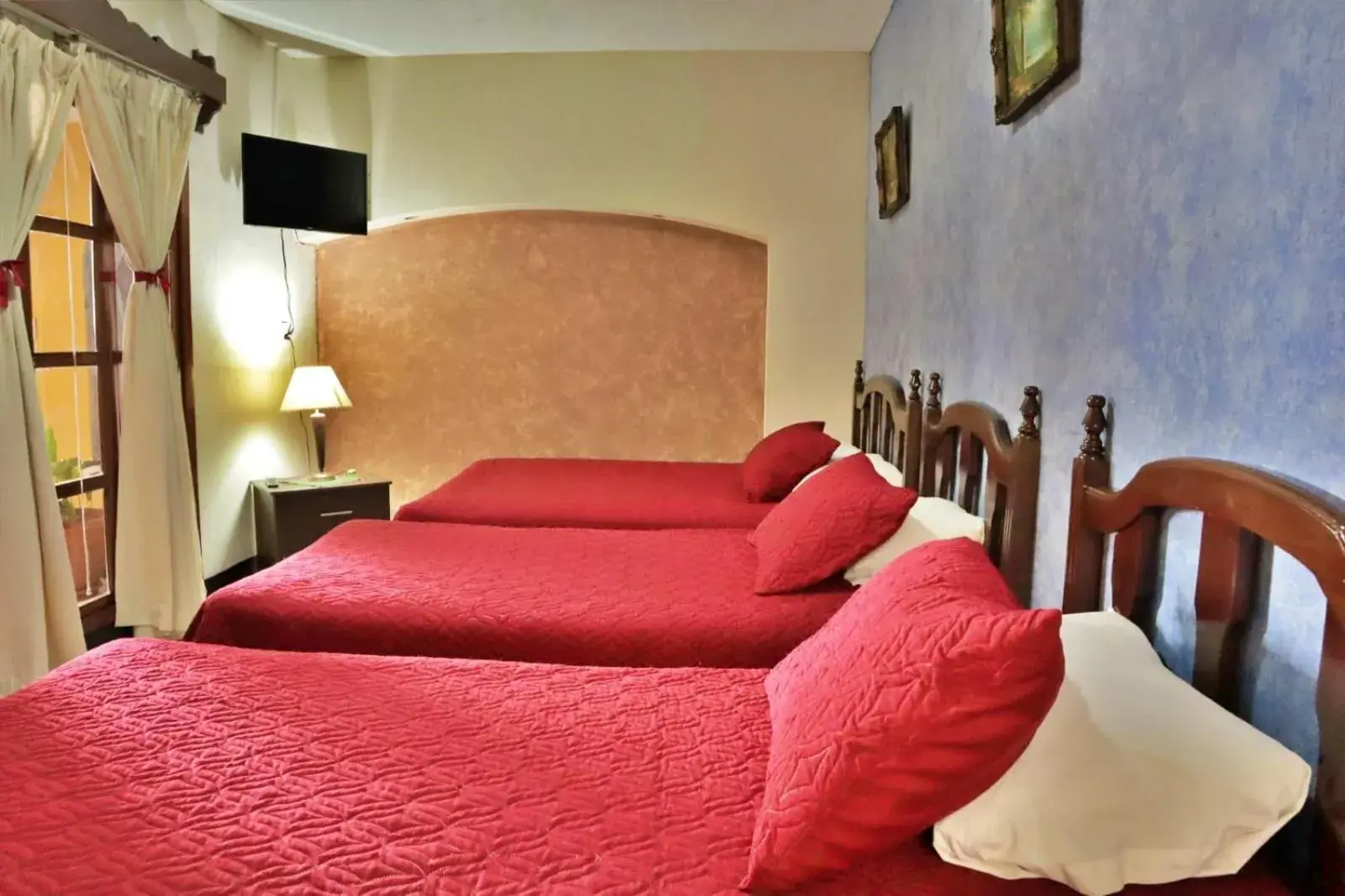 Standard Quadruple Room in Hotel Posada San Miguel Standard Quadruple Room in Hotel Posada San Miguel