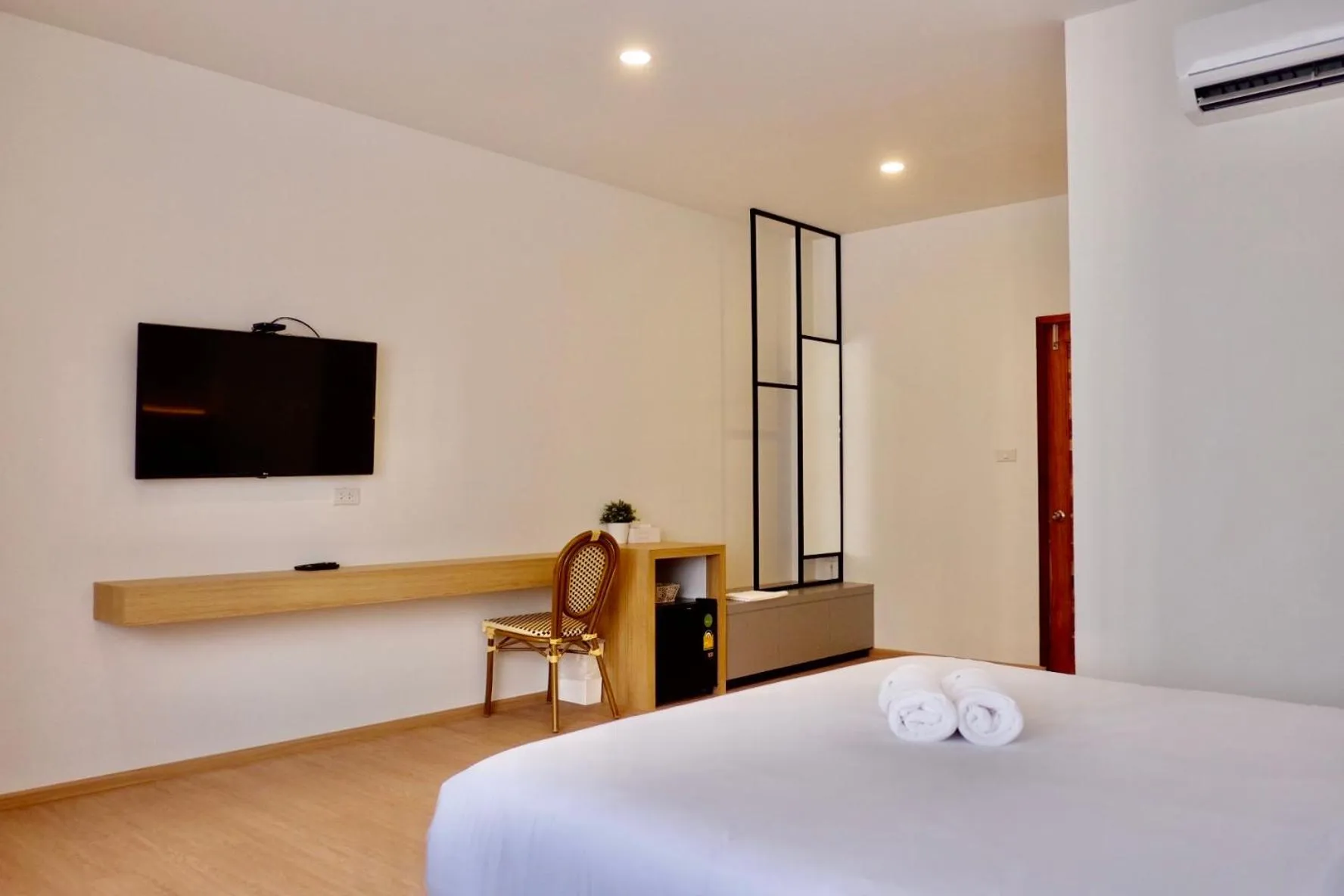 Bed in Busaba Bella Hotel