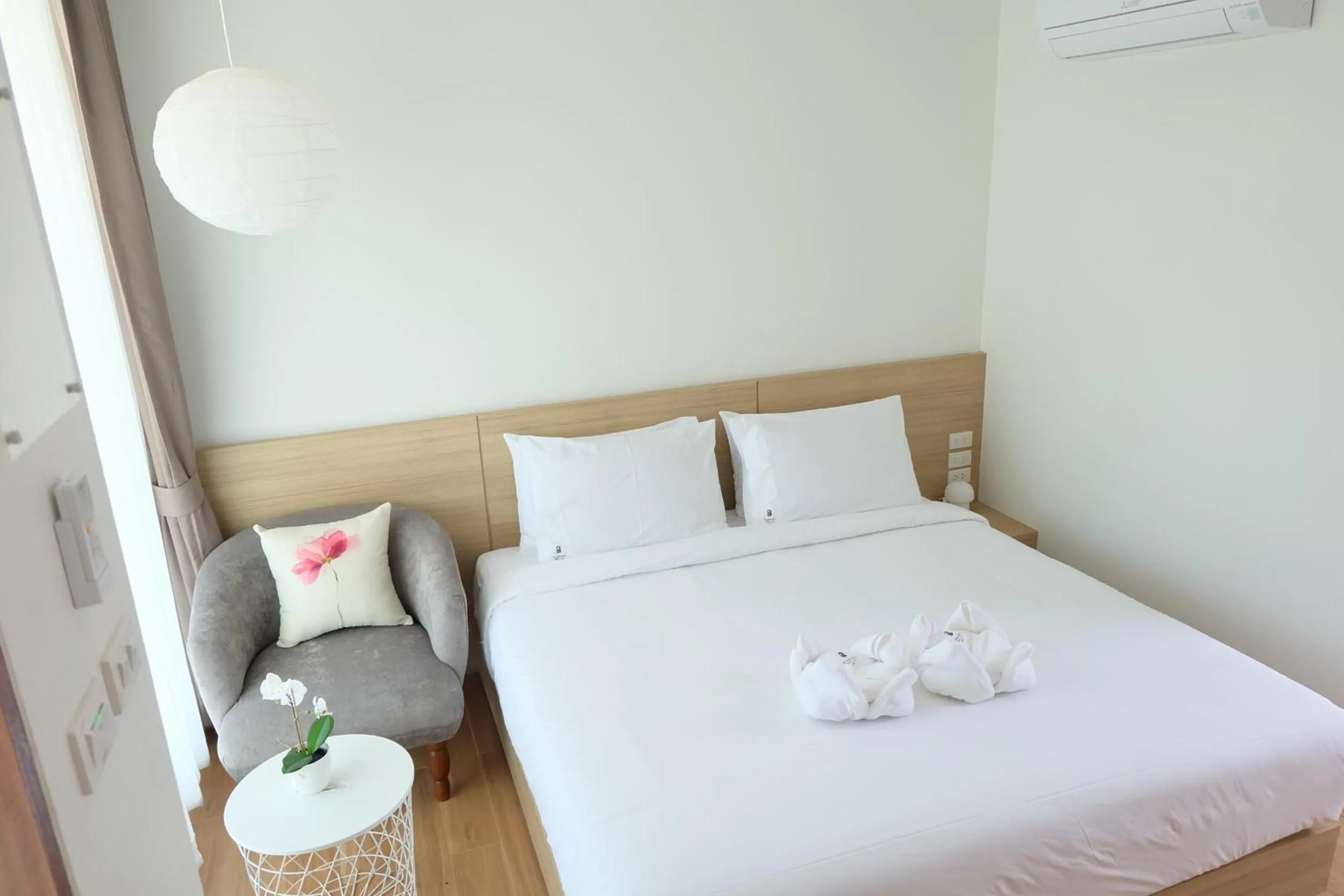 Bed in Busaba Bella Hotel