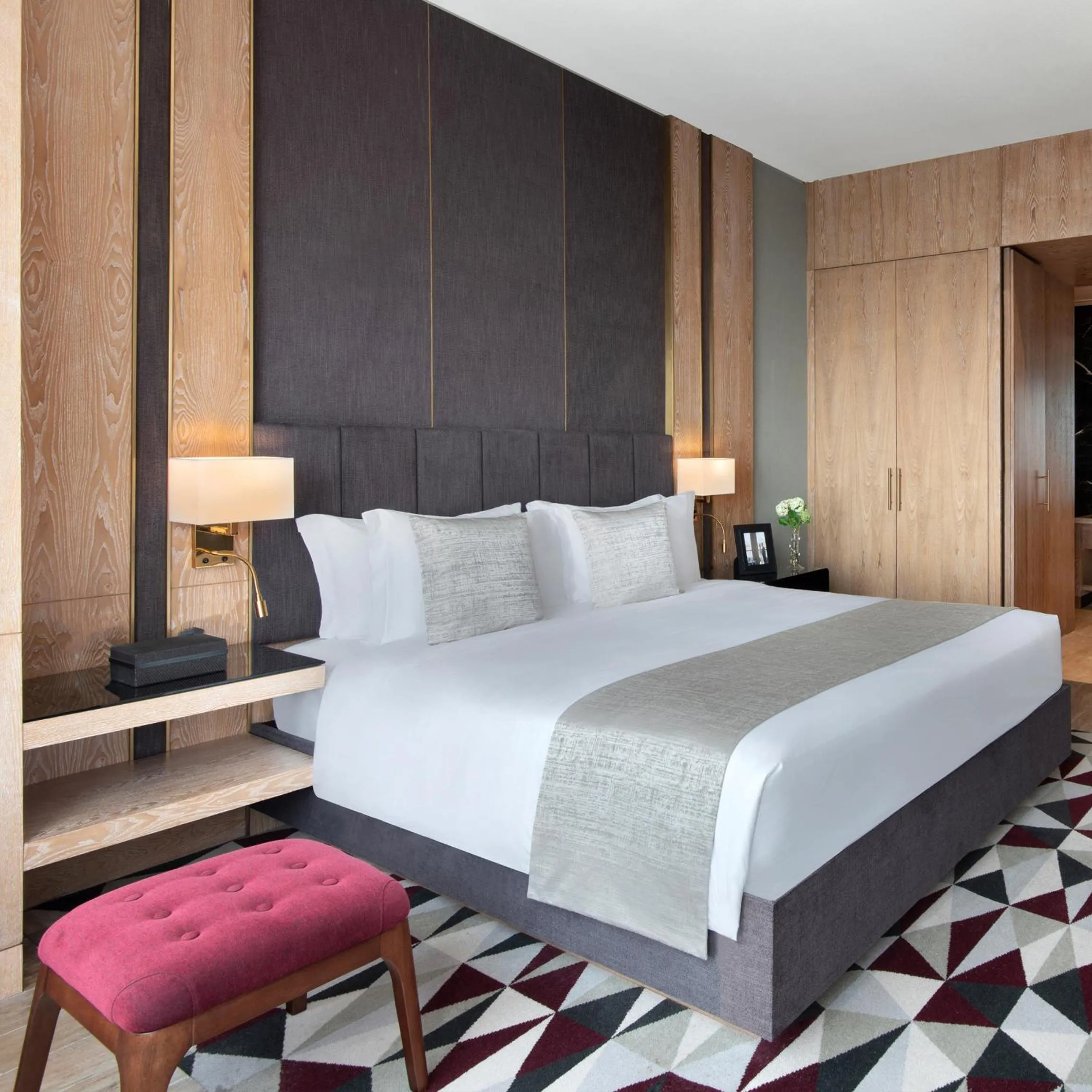 Bed in The Bentley Luxury Hotel & Suites