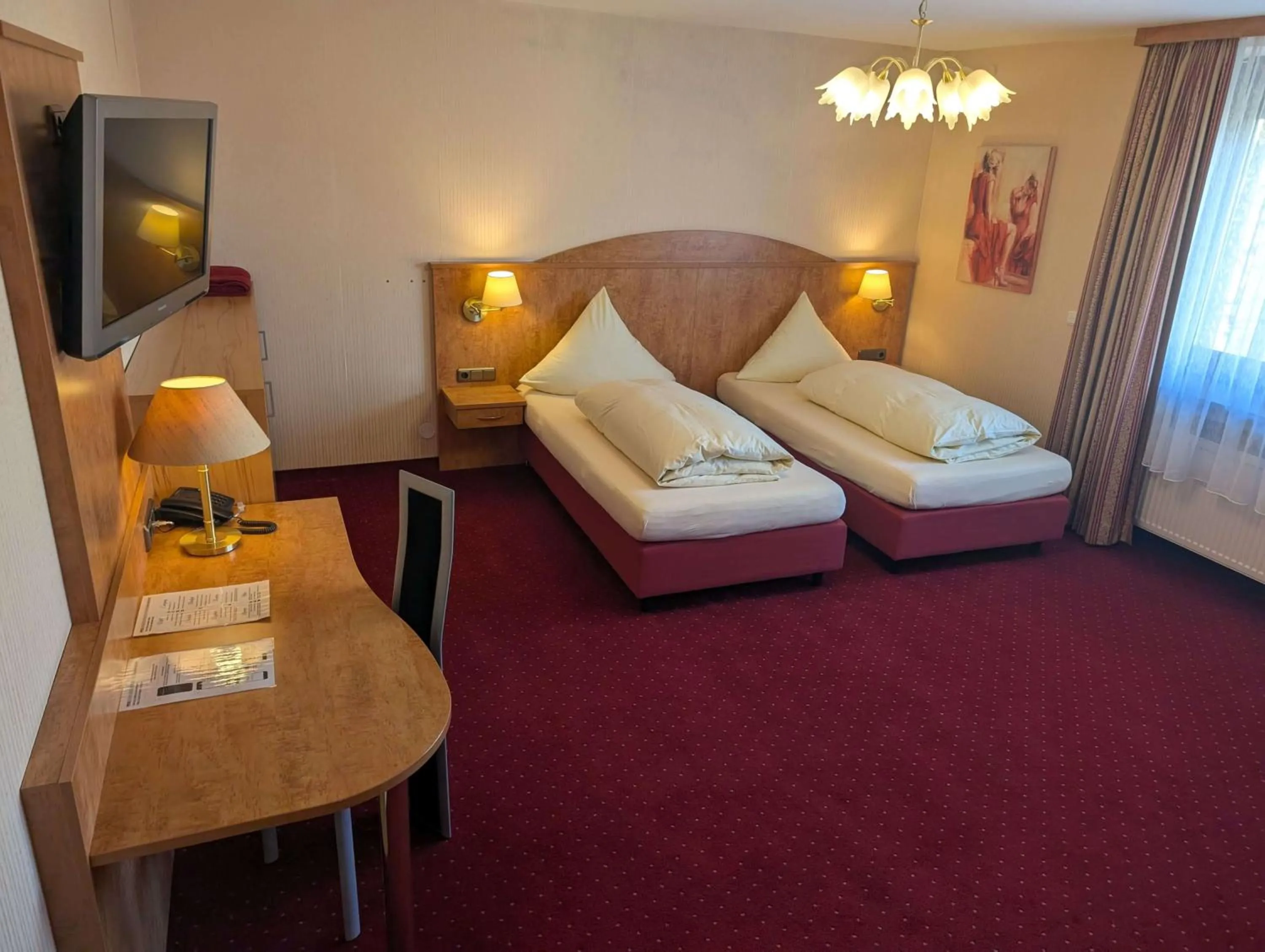 Bed in Stadthotel Augsburg