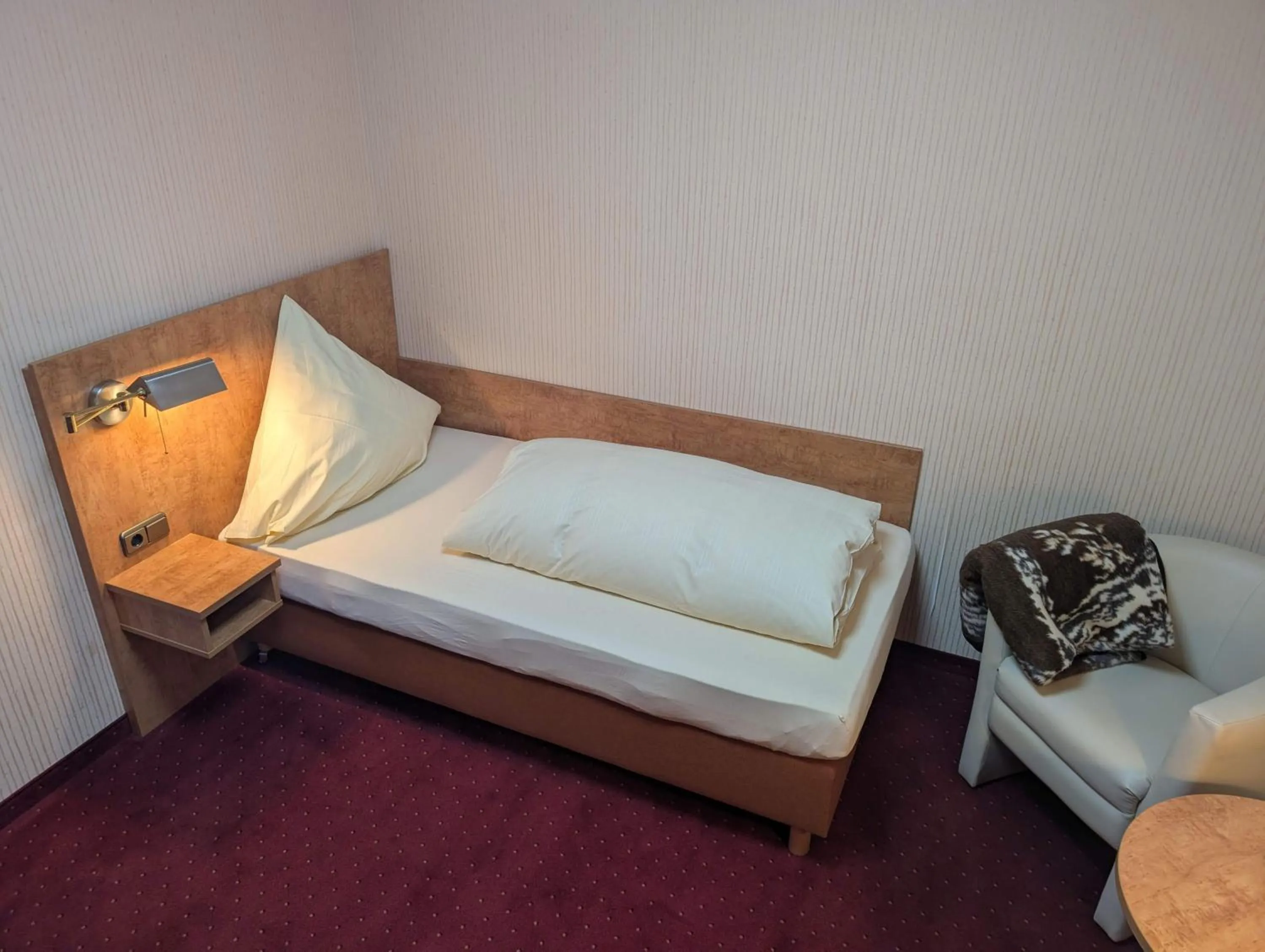 Bed in Stadthotel Augsburg
