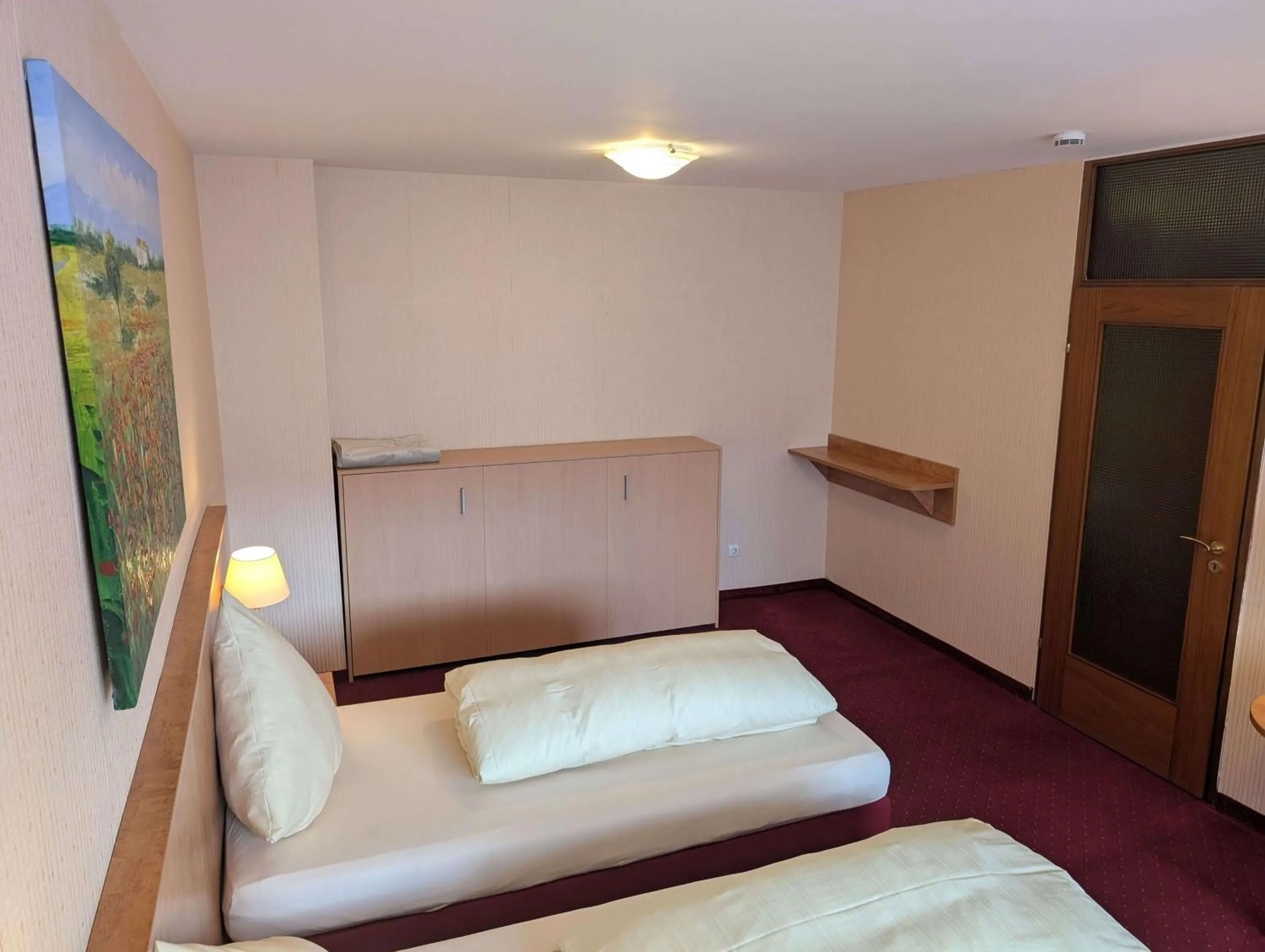 Bed in Stadthotel Augsburg