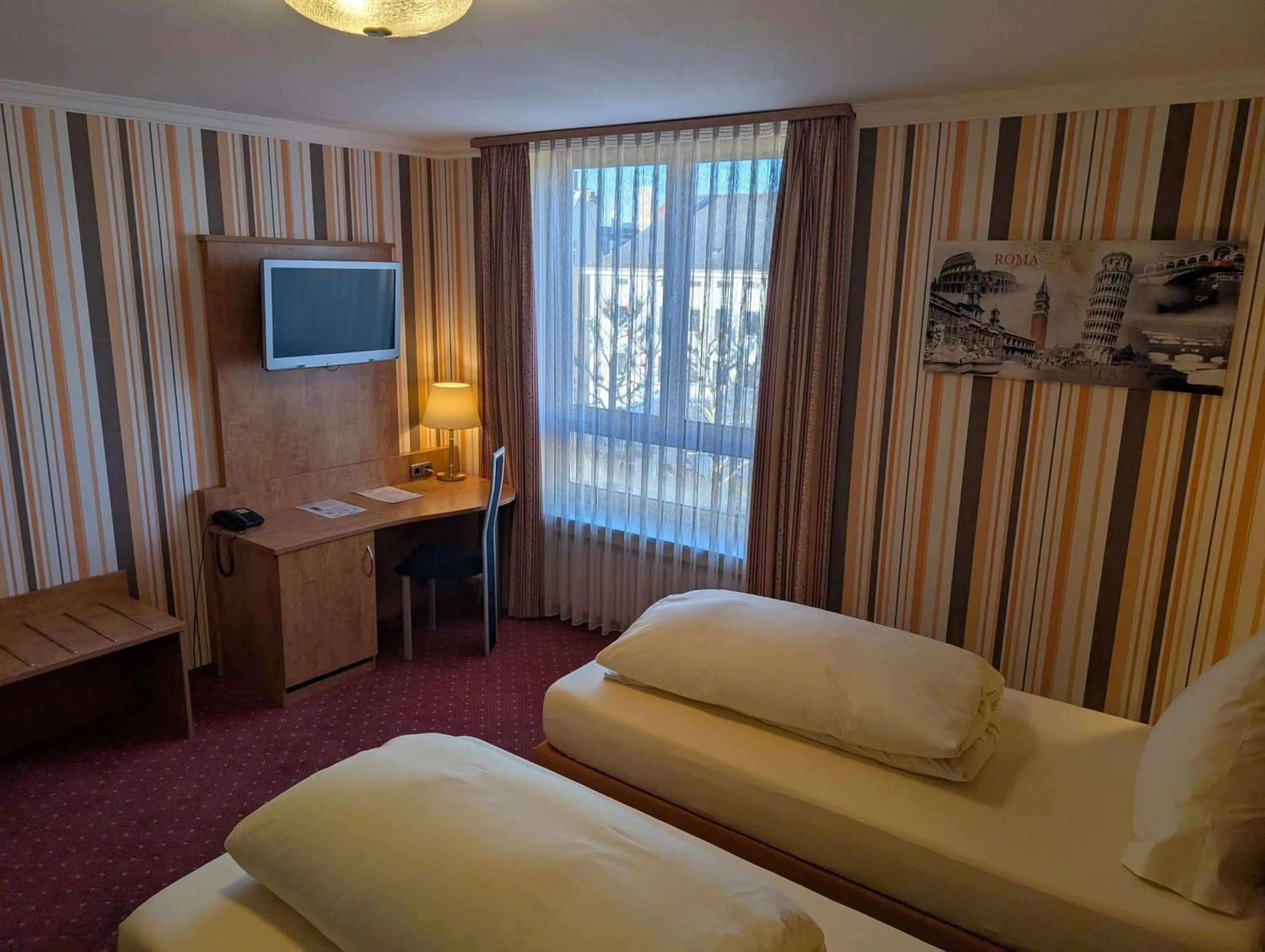 Bed in Stadthotel Augsburg