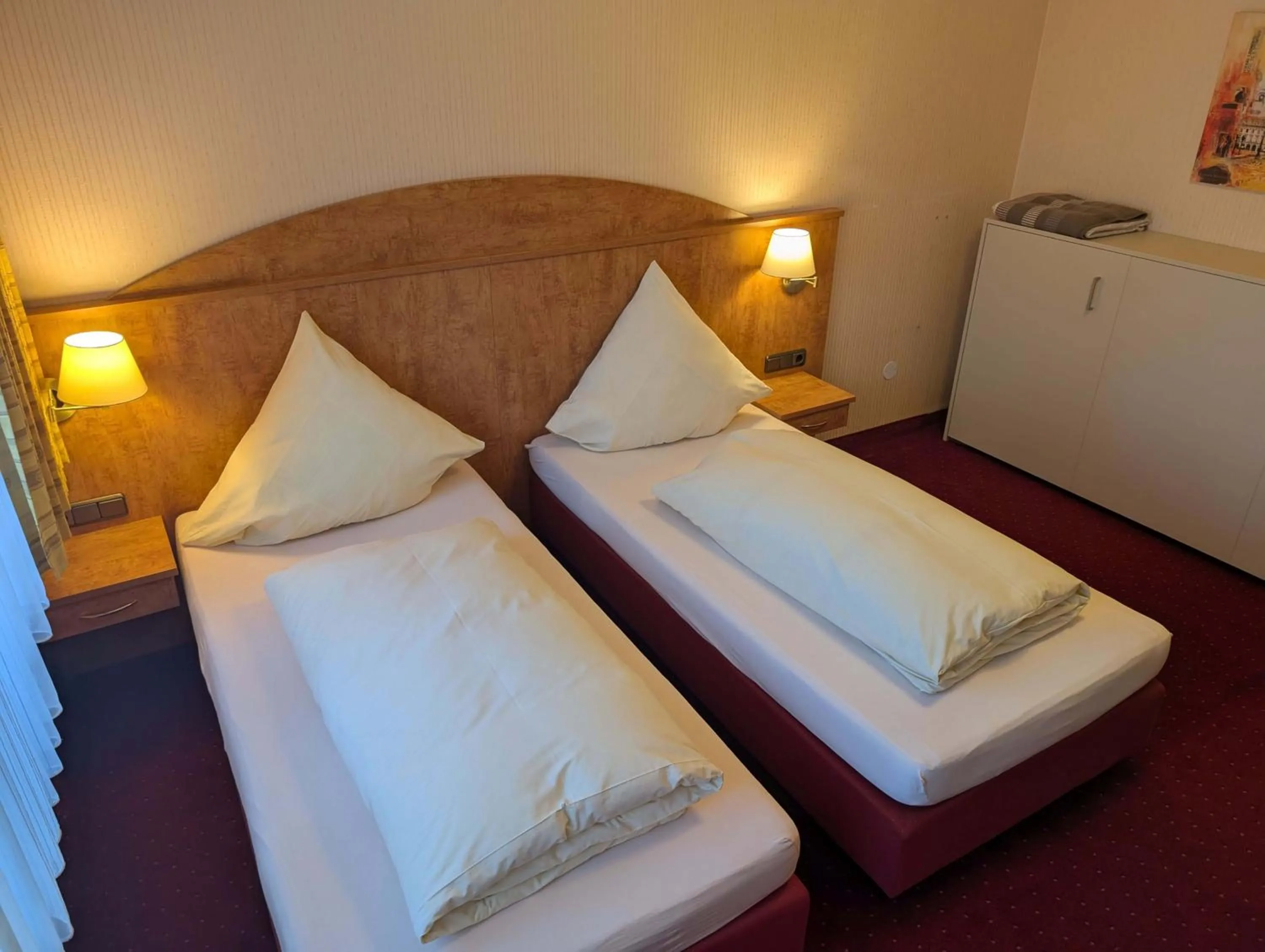 Bed in Stadthotel Augsburg