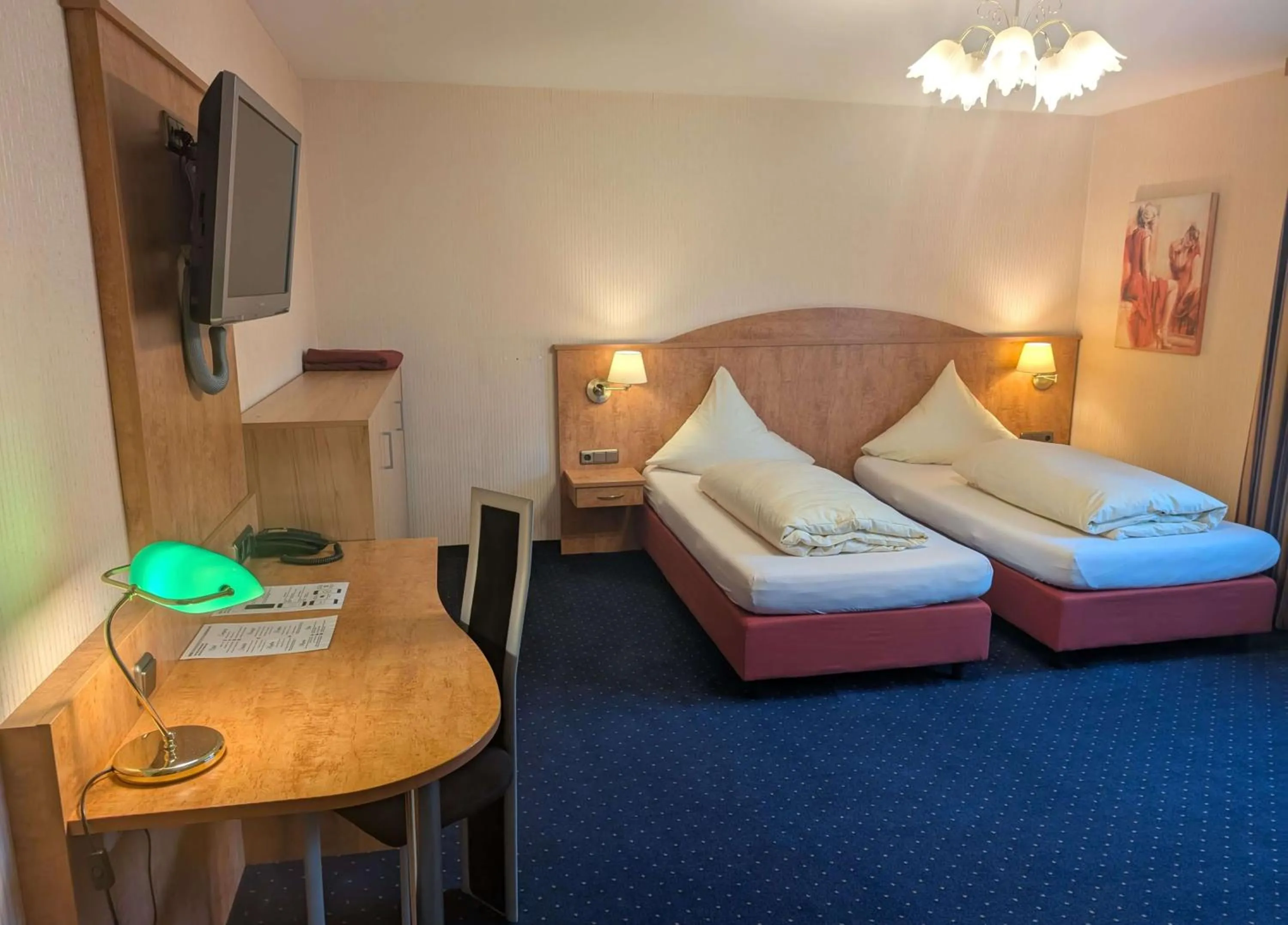 Bed in Stadthotel Augsburg