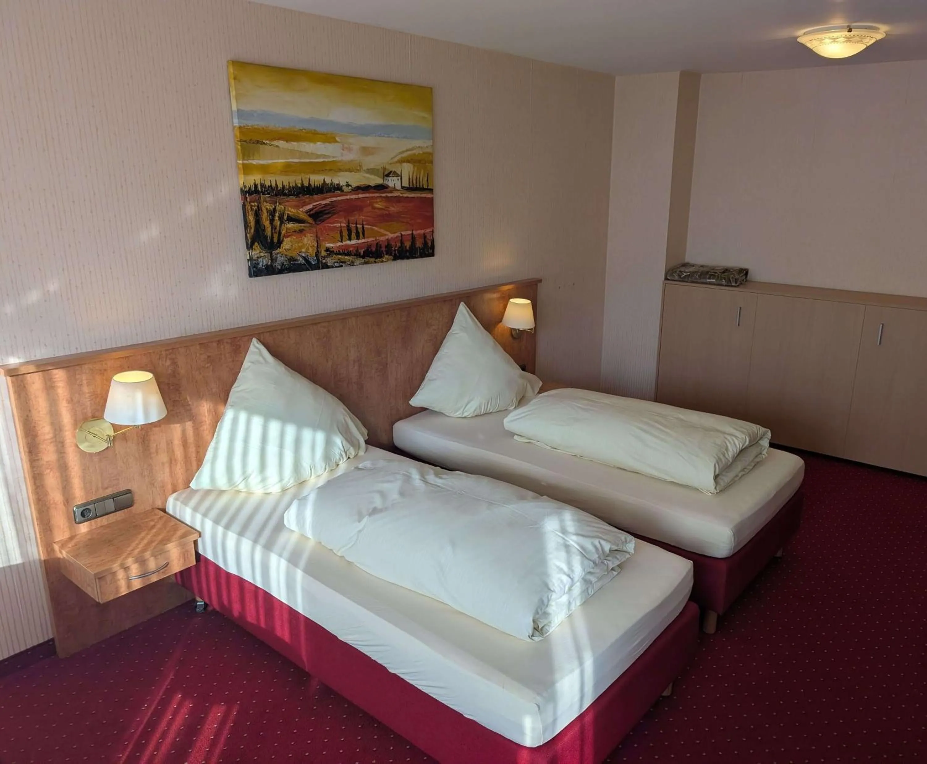 Bed in Stadthotel Augsburg