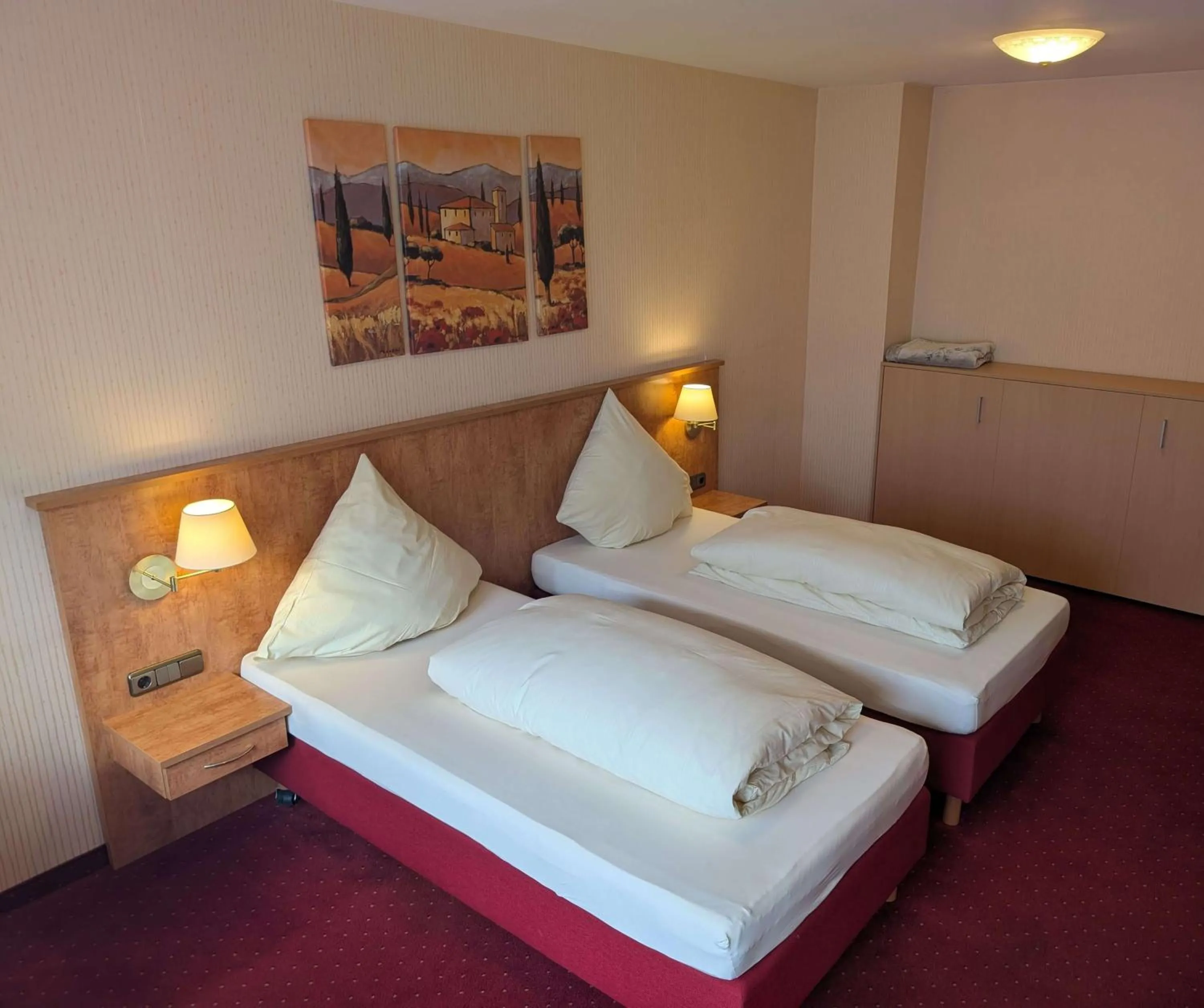 Bed in Stadthotel Augsburg