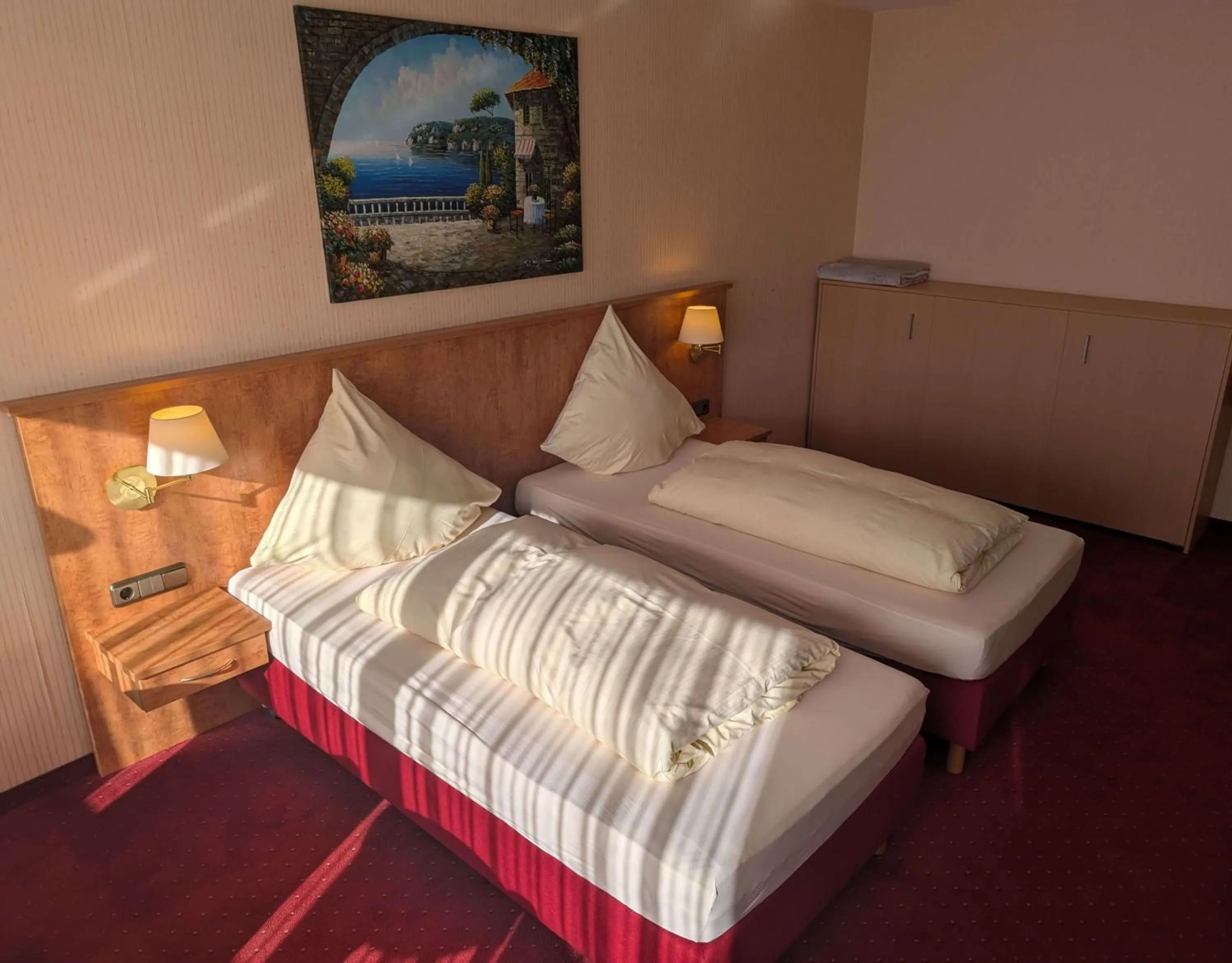 Bed in Stadthotel Augsburg