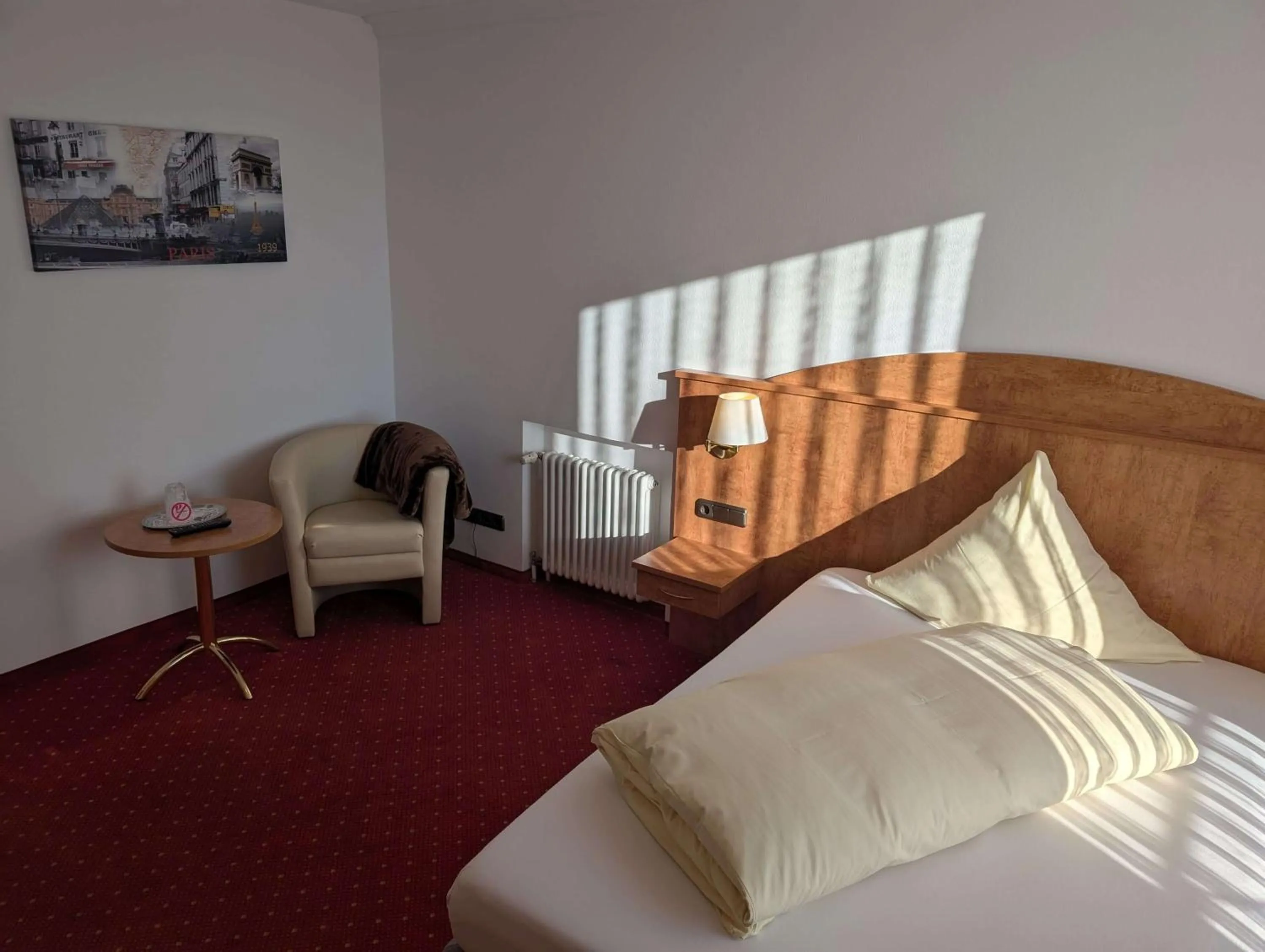 Bed in Stadthotel Augsburg