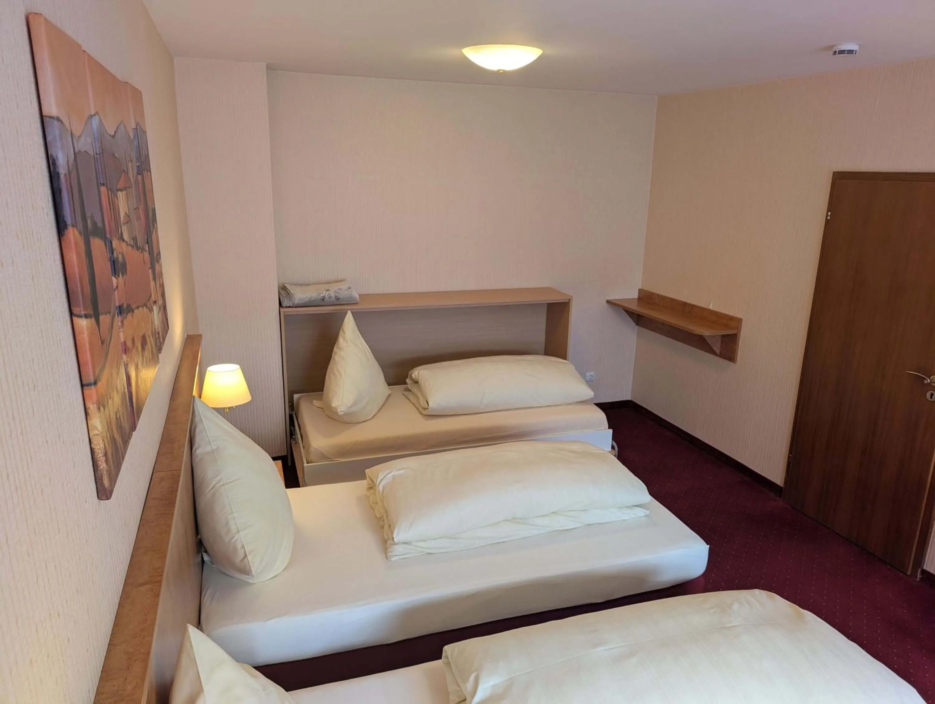 Bed in Stadthotel Augsburg