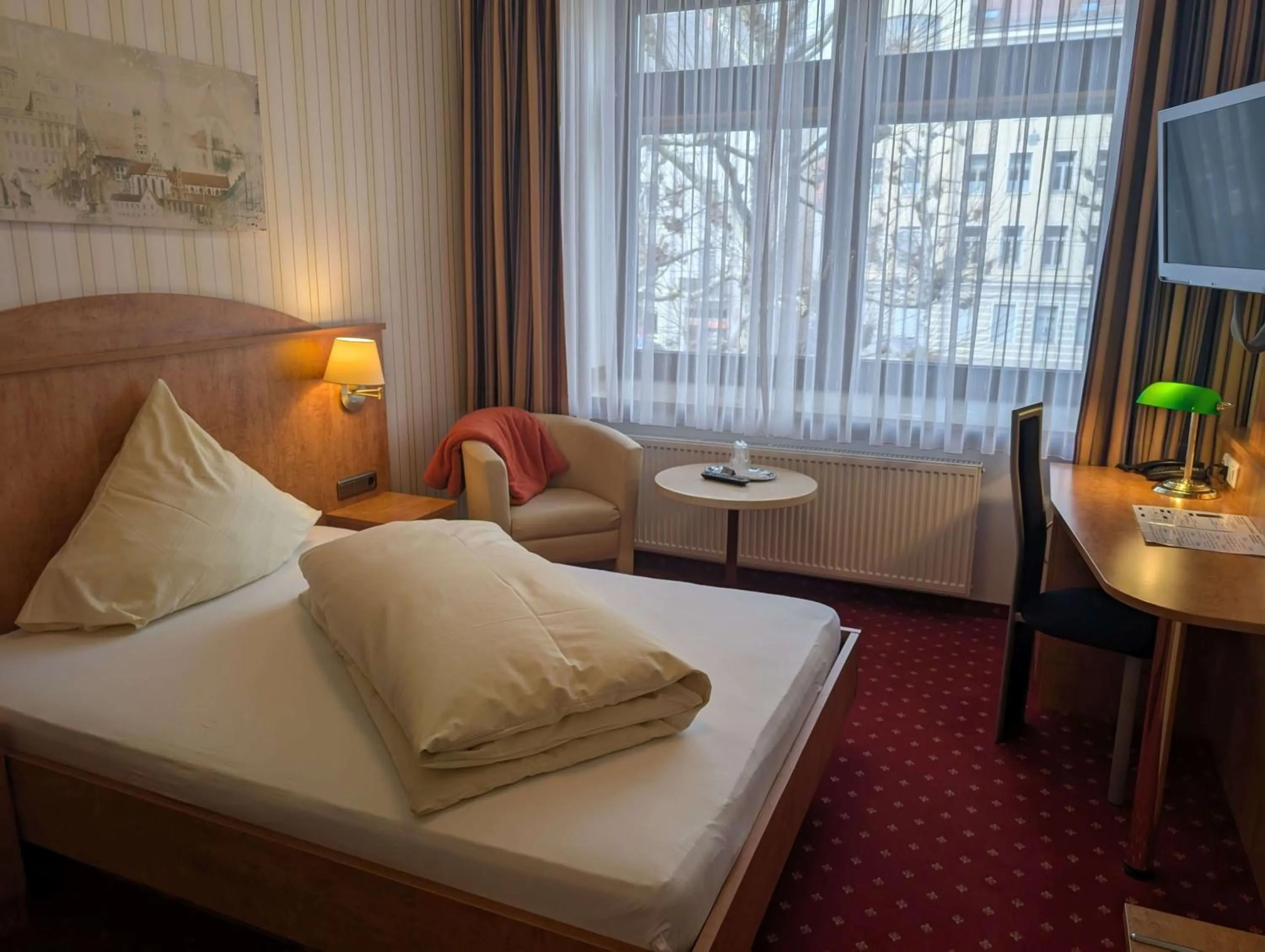 Bed in Stadthotel Augsburg