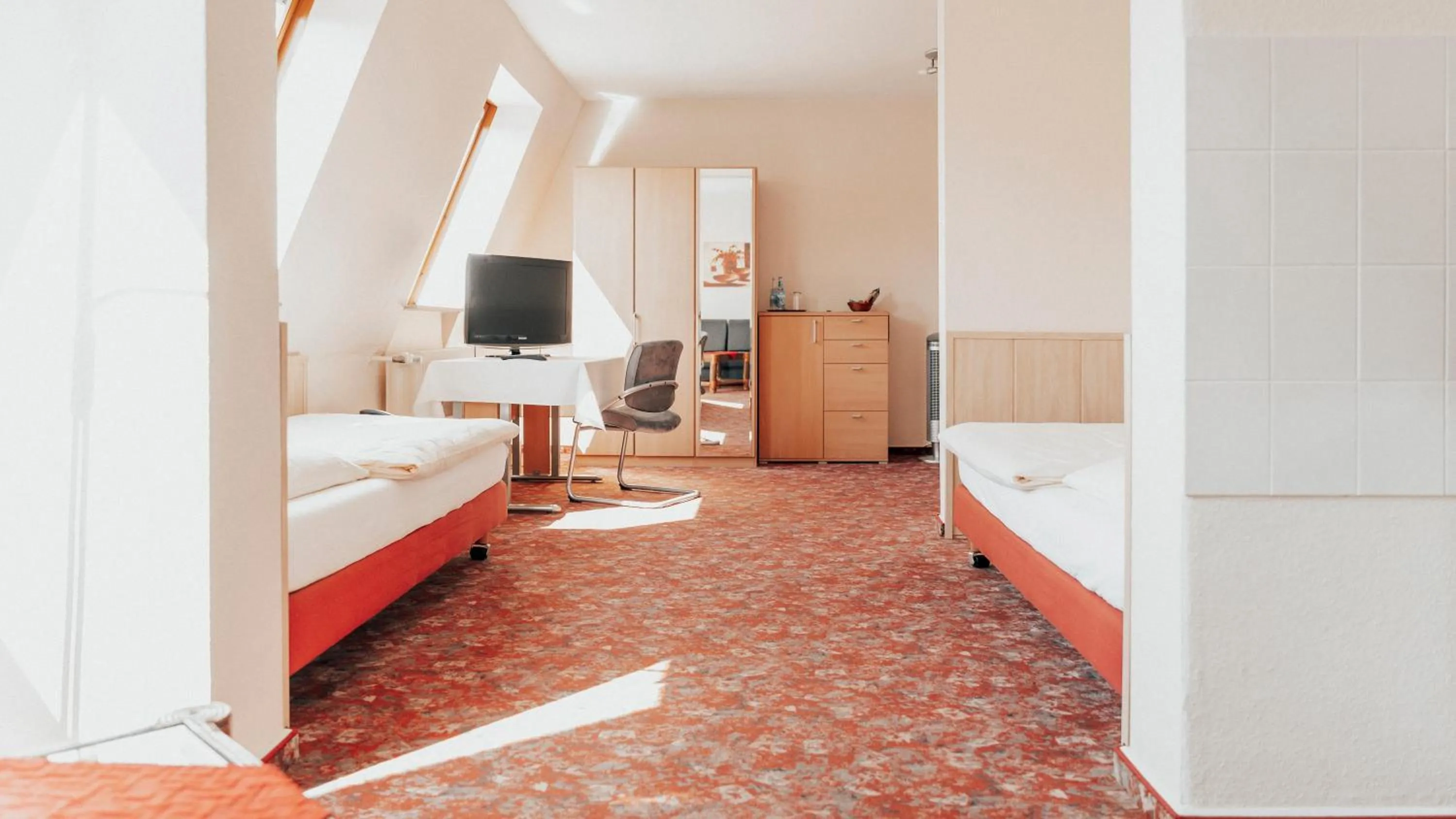 Living room, Bed in Avantgarde Hotel