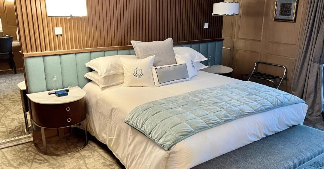 Bed in The Carlin Boutique Hotel