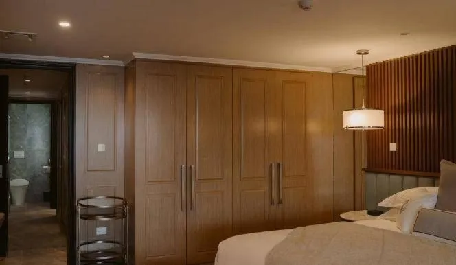 Bed in The Carlin Boutique Hotel