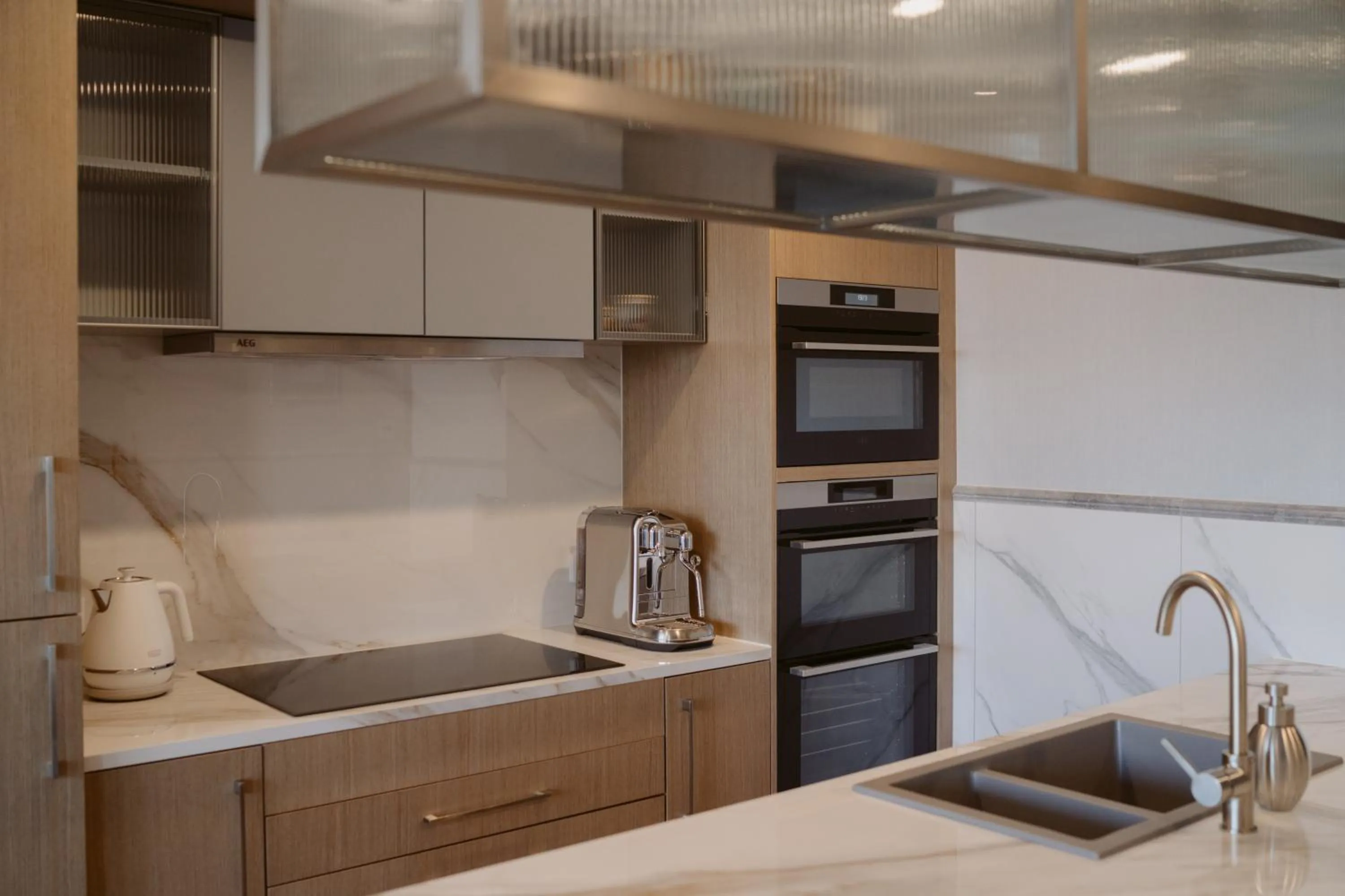 Kitchen or kitchenette in The Carlin Boutique Hotel