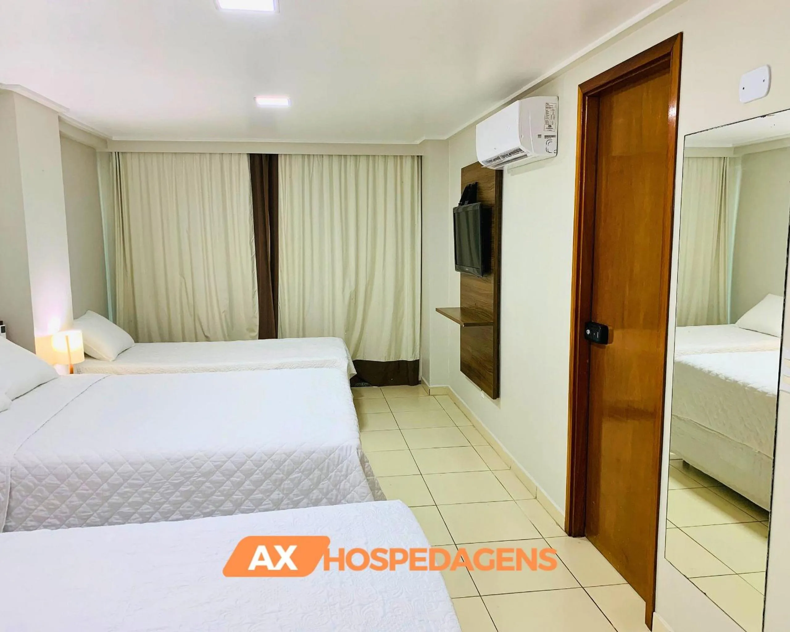 Bed in AX Blue Suítes