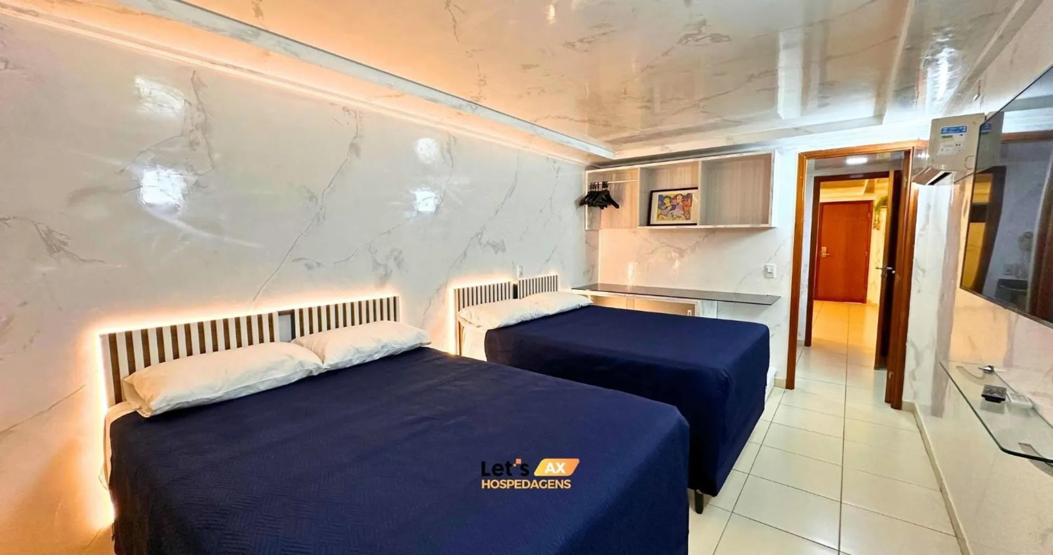 Bed in AX Blue Suítes