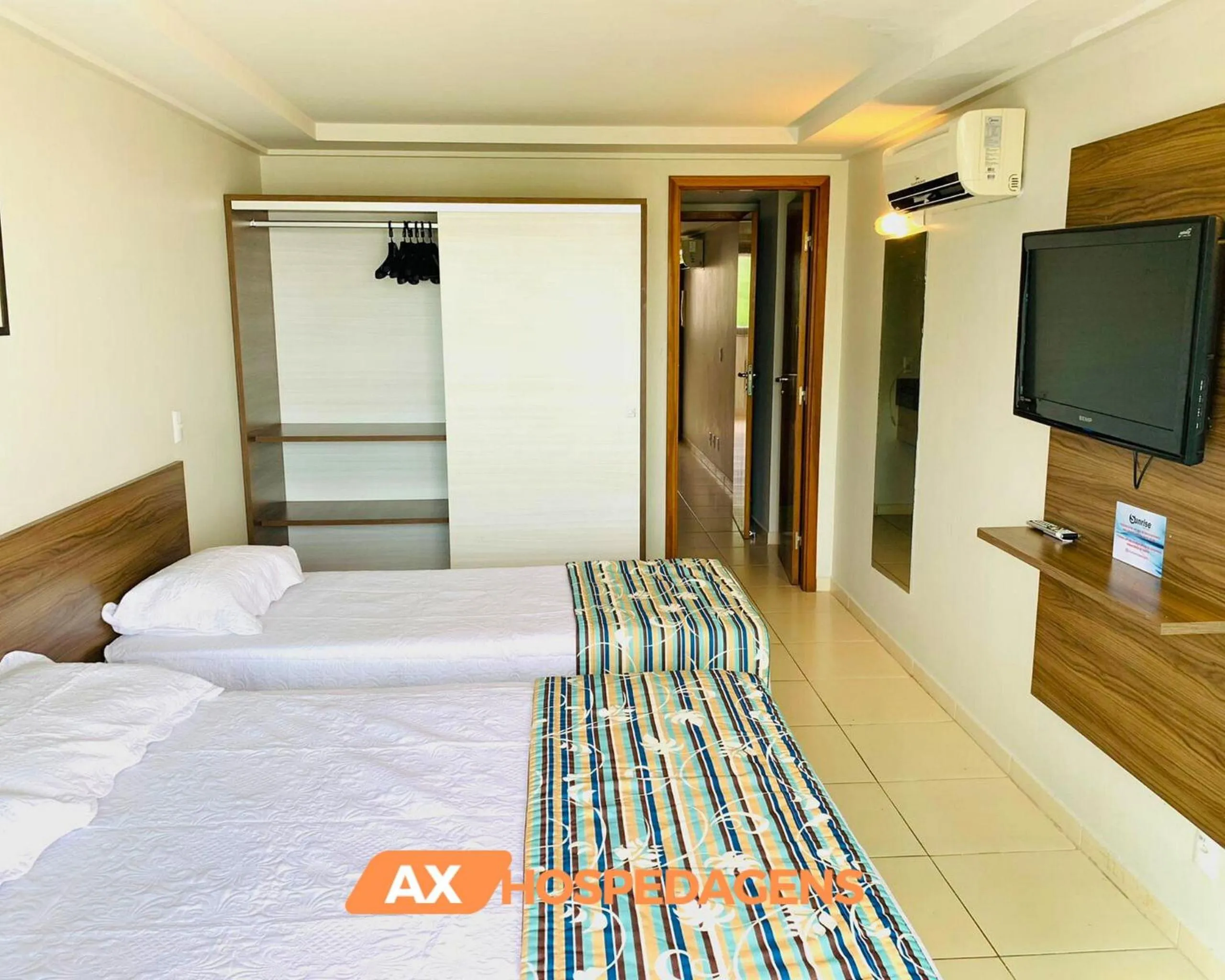 Bed in AX Blue Suítes