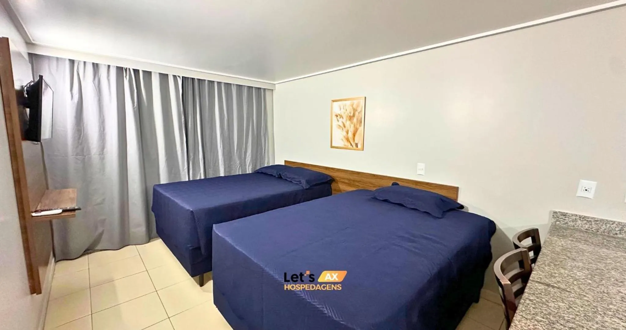 Photo of the whole room, Bed in AX Blue Suítes