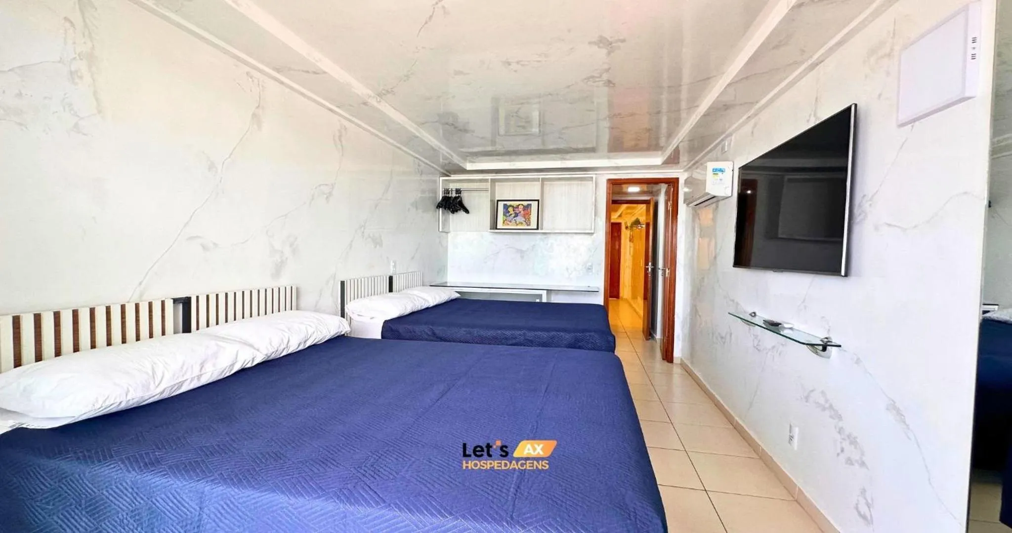 Bed in AX Blue Suítes