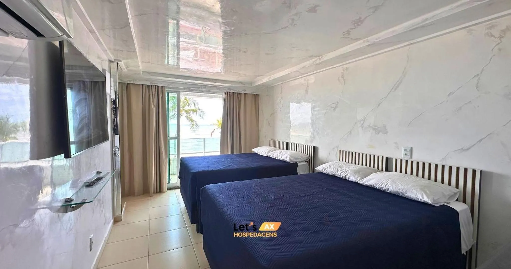 Bed in AX Blue Suítes