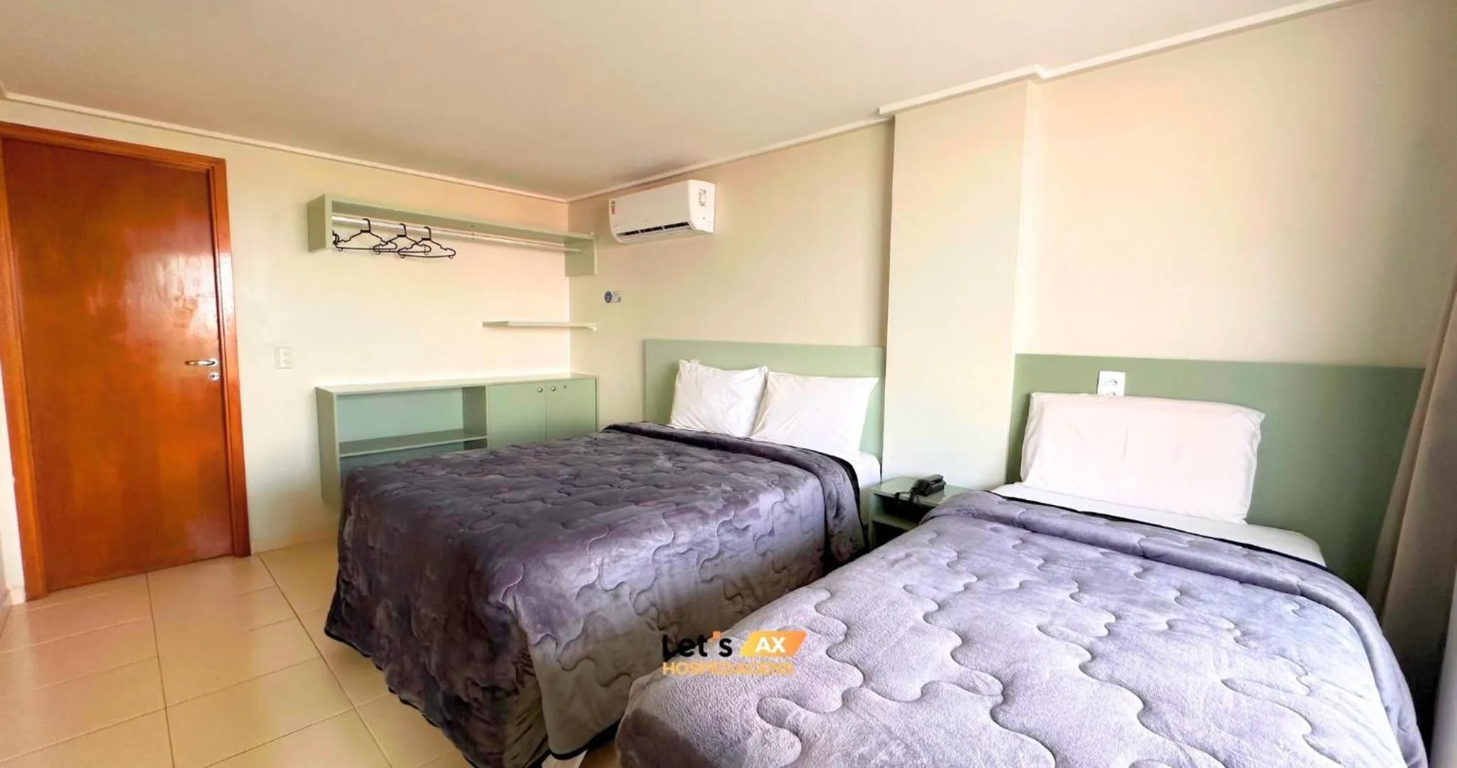 Bed in AX Blue Suítes