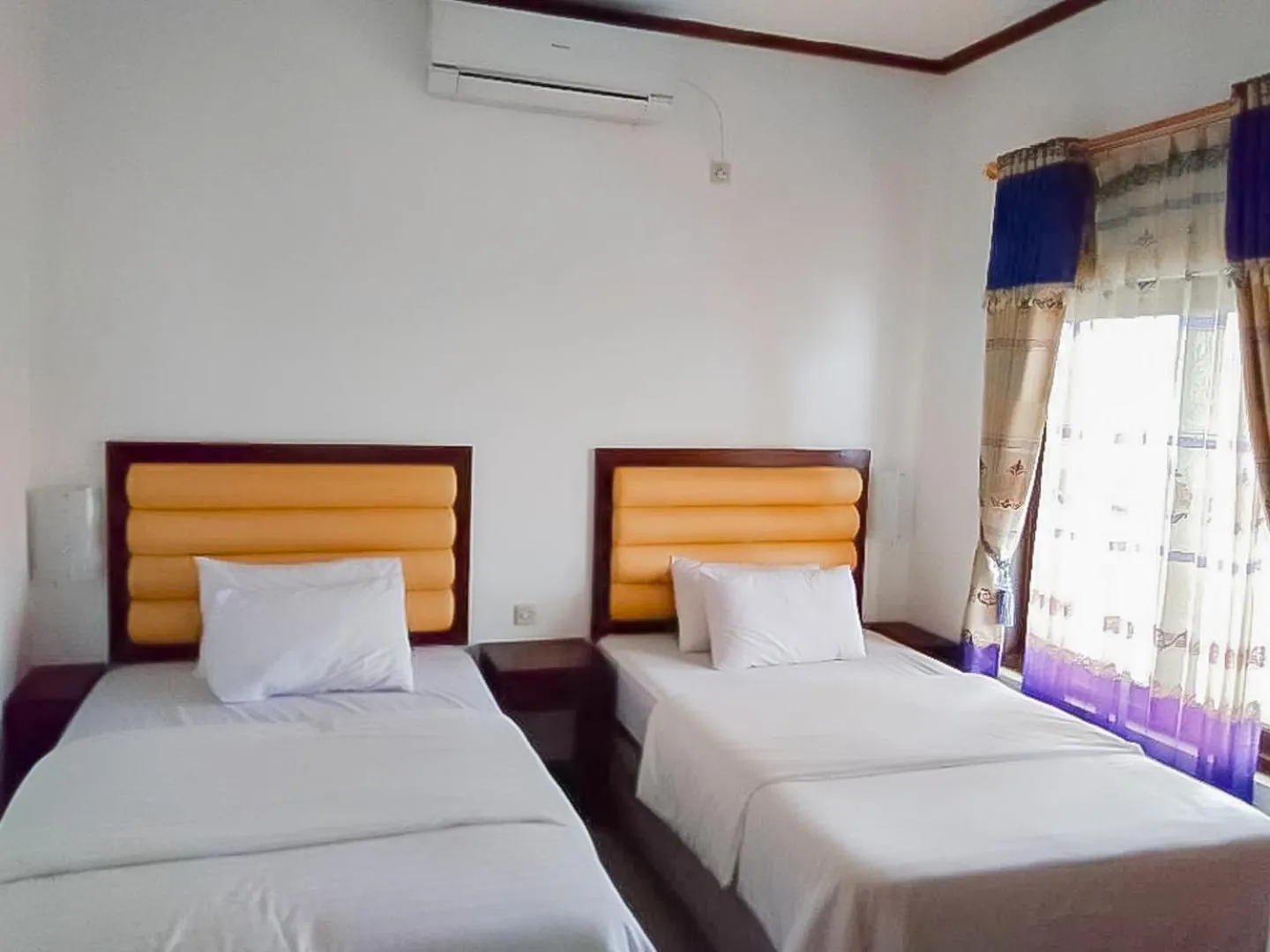 Bathroom, Bed in RedDoorz Syariah near Sunrise Park Pangandaran