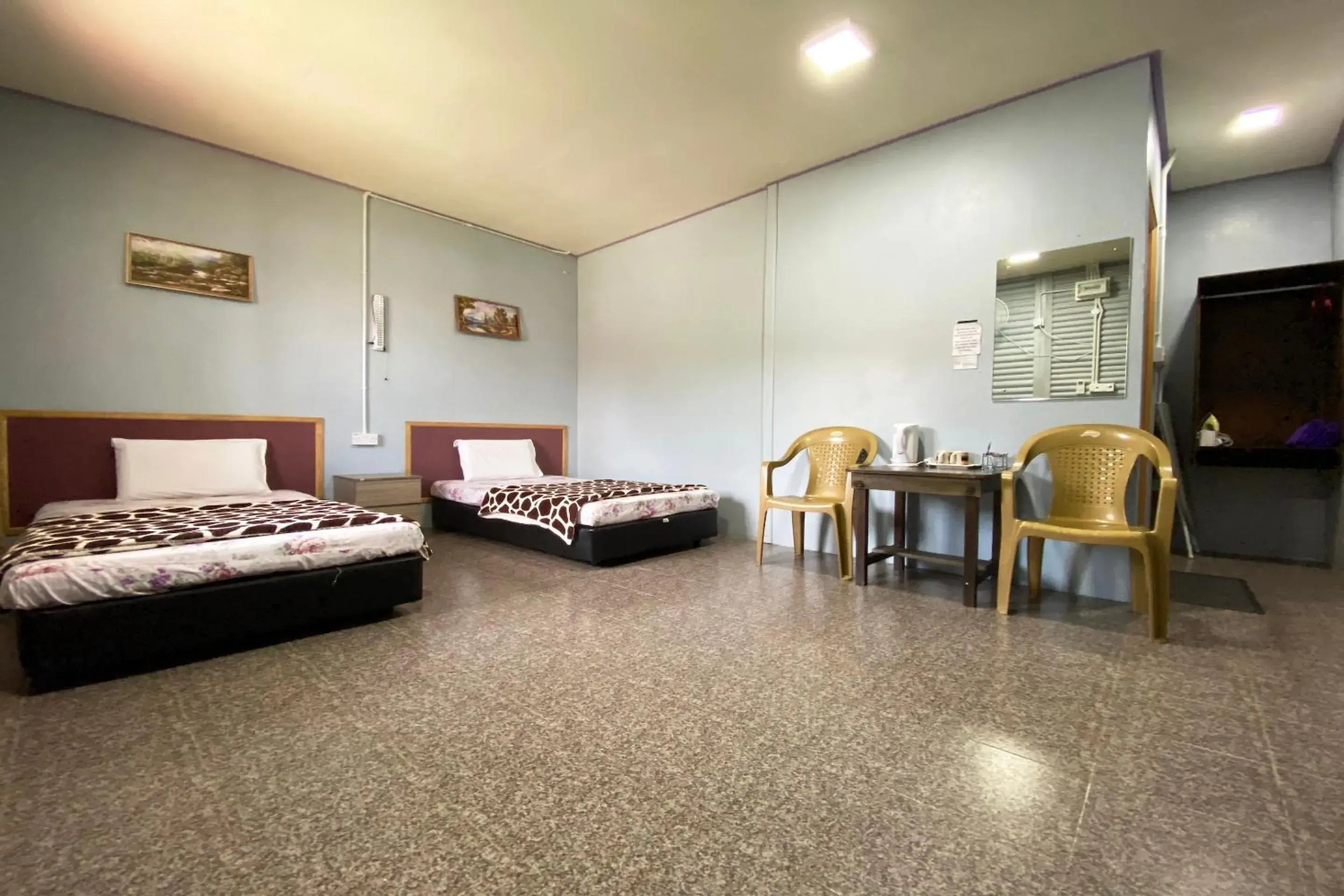 Deluxe Twin Room in Hotel O Kampung Stay Kilimu Deluxe Twin Room in Hotel O Kampung Stay Kilimu