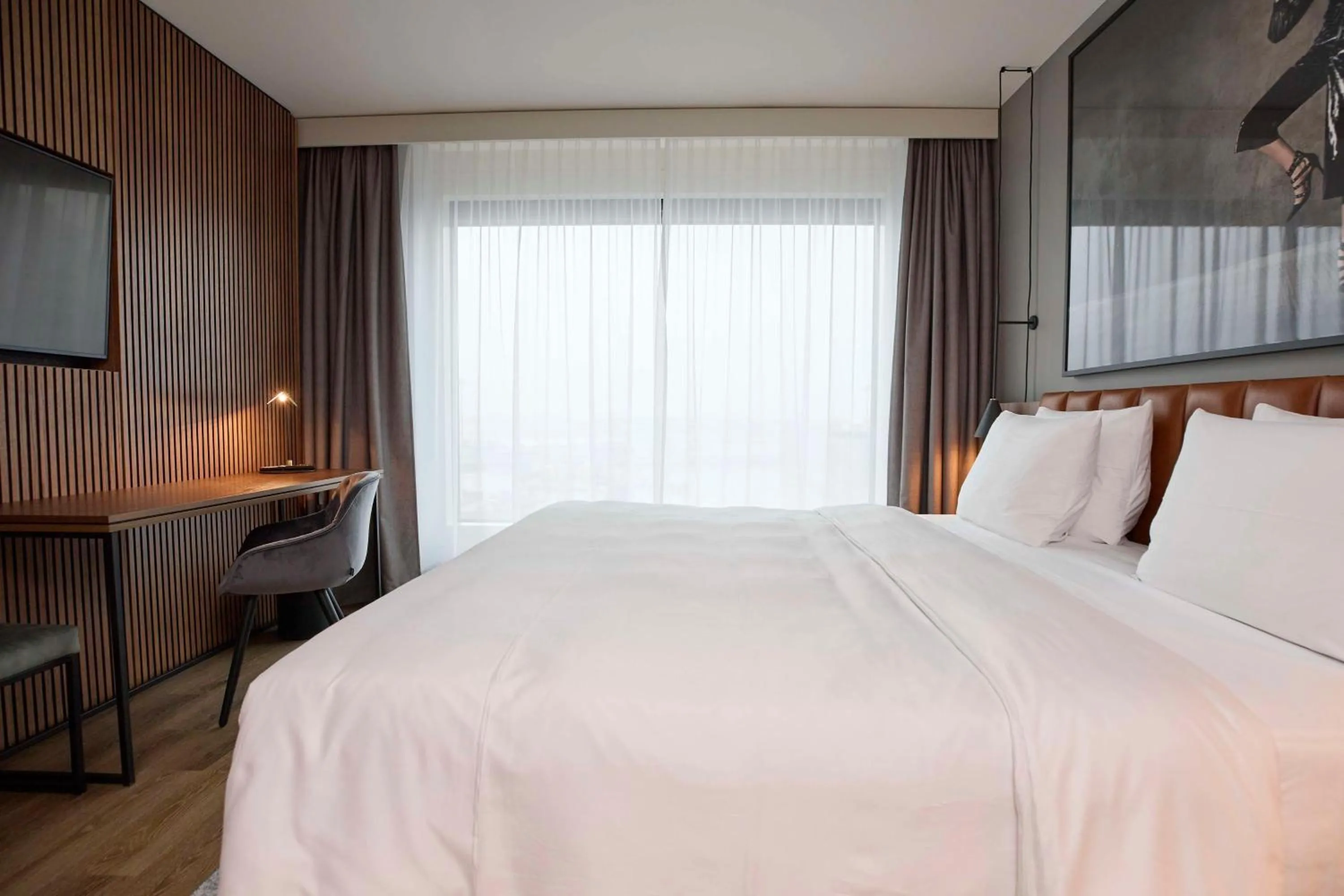 Photo of the whole room, Bed in Radisson Blu Hotel Zurich Airport