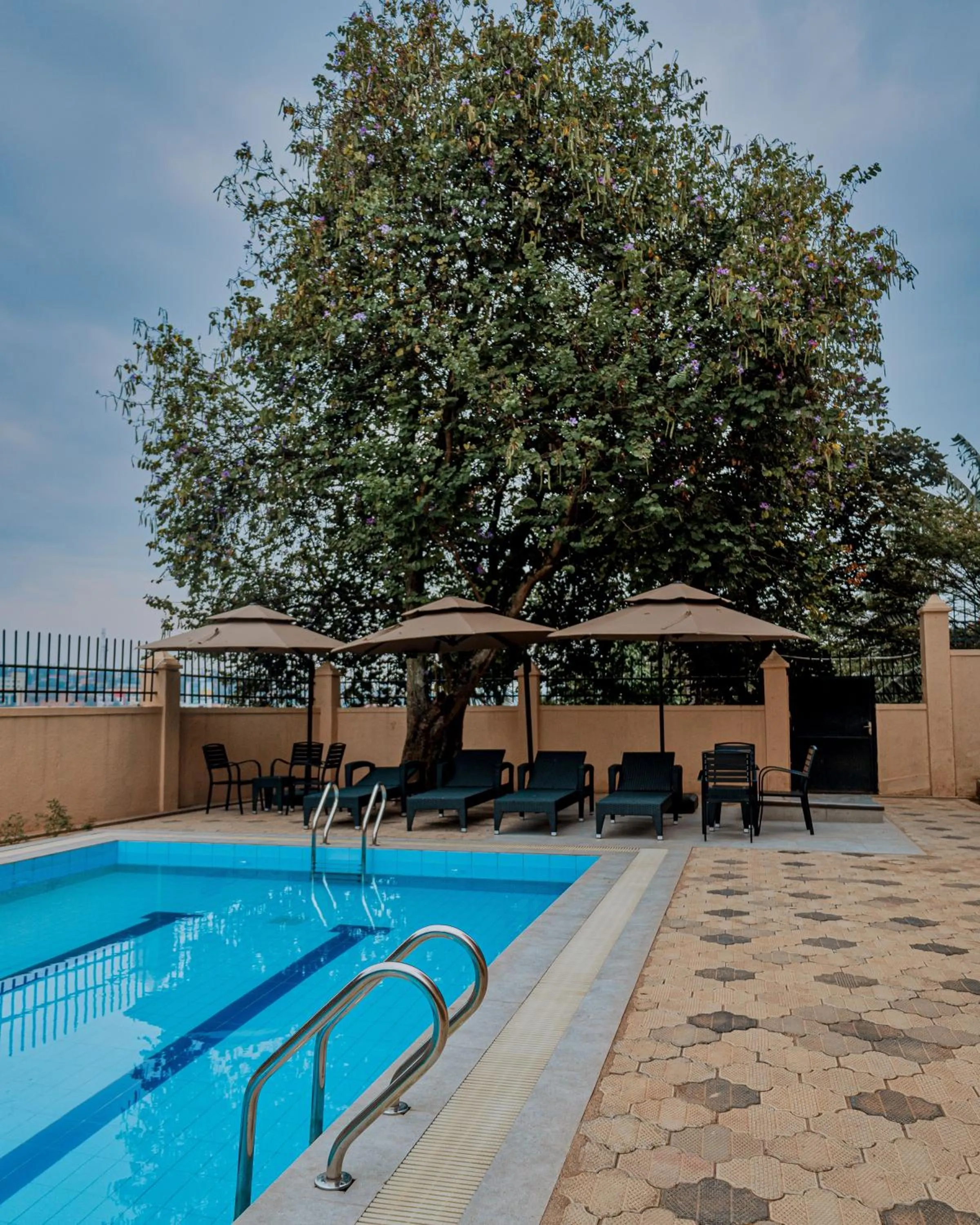 Swimming pool in Rose Garden Private Apartment By LINK