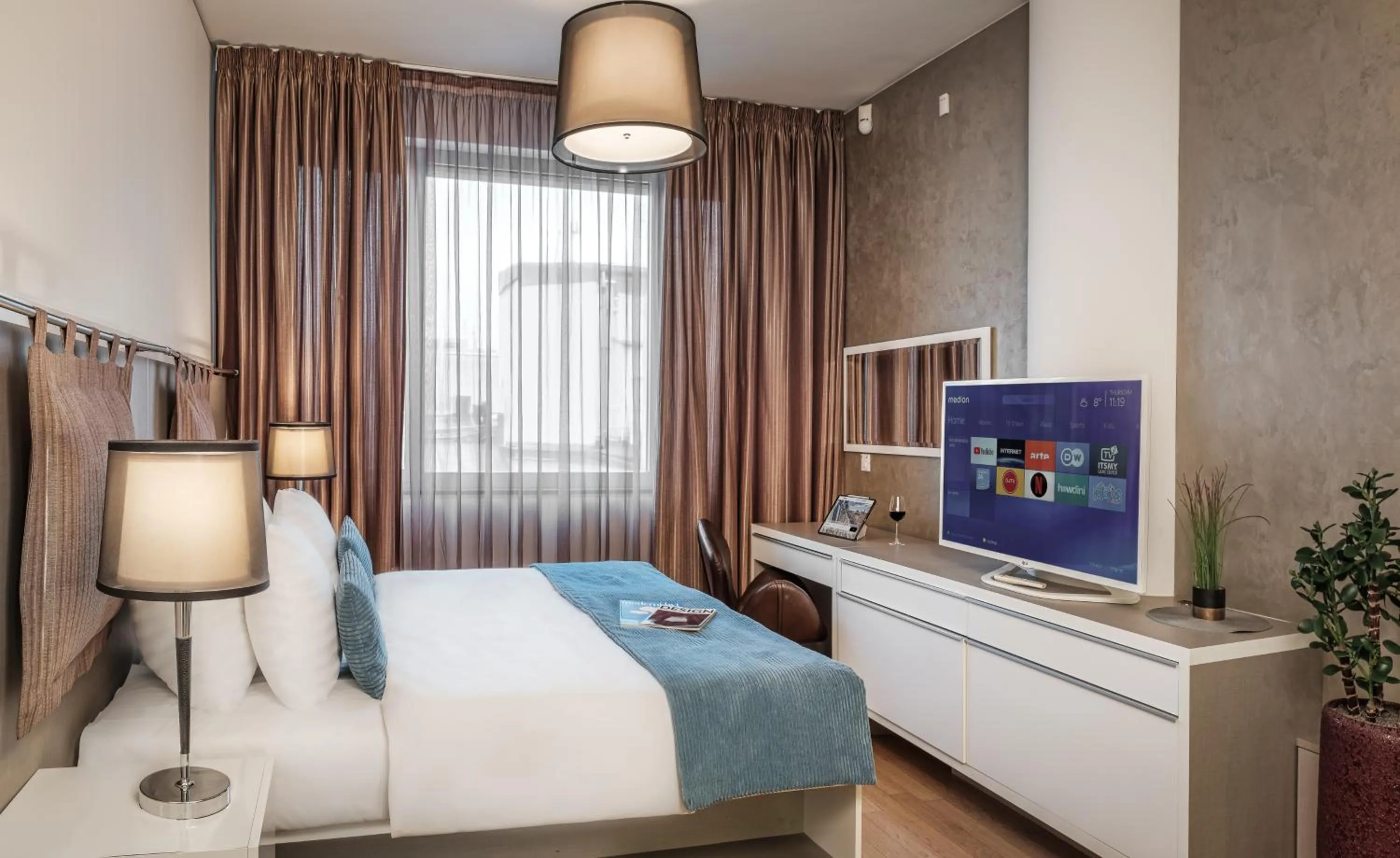 Bed in VN3 Terraces Suites by Adrez