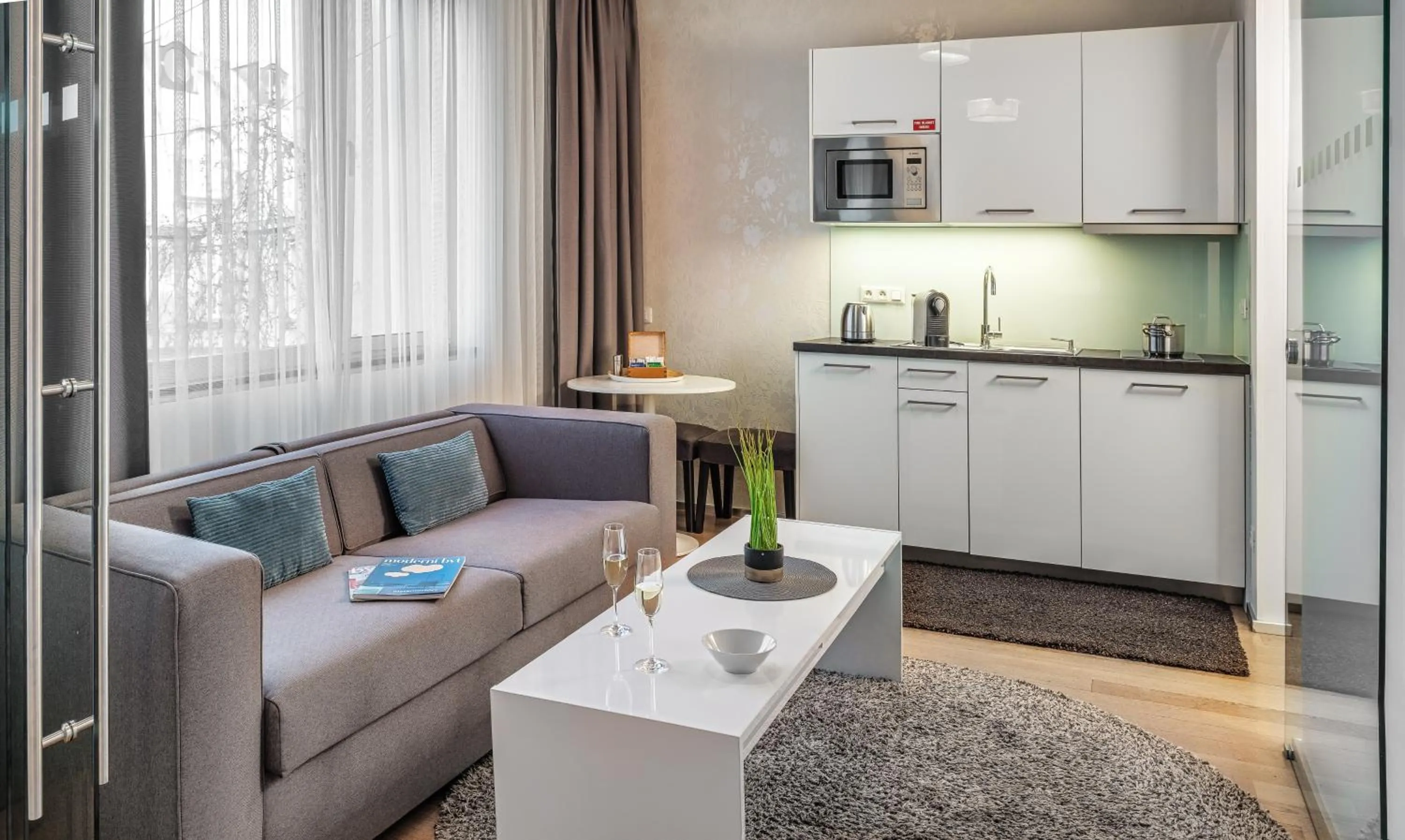 Seating area in VN3 Terraces Suites by Adrez