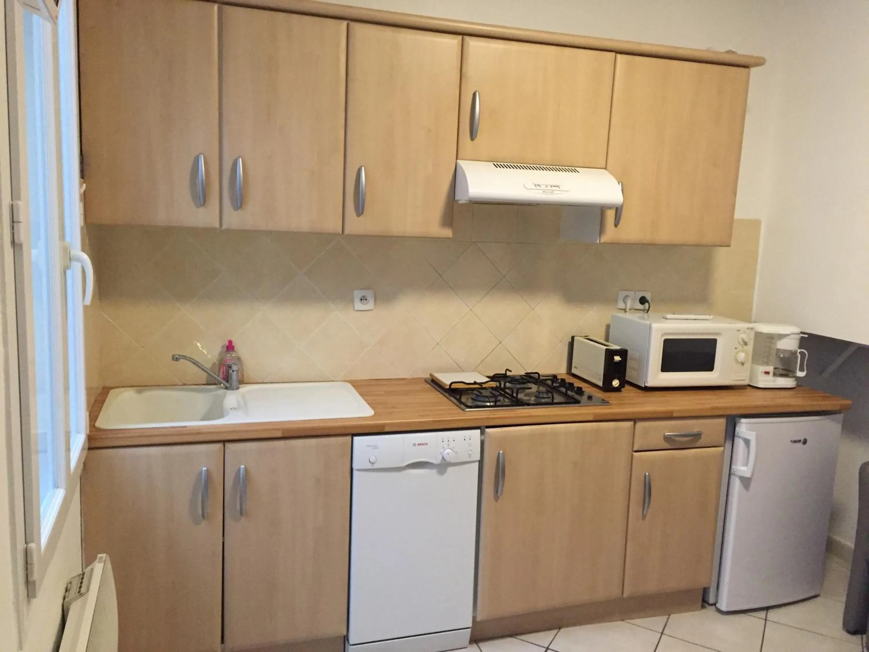 Kitchen or kitchenette in Résidence Natura