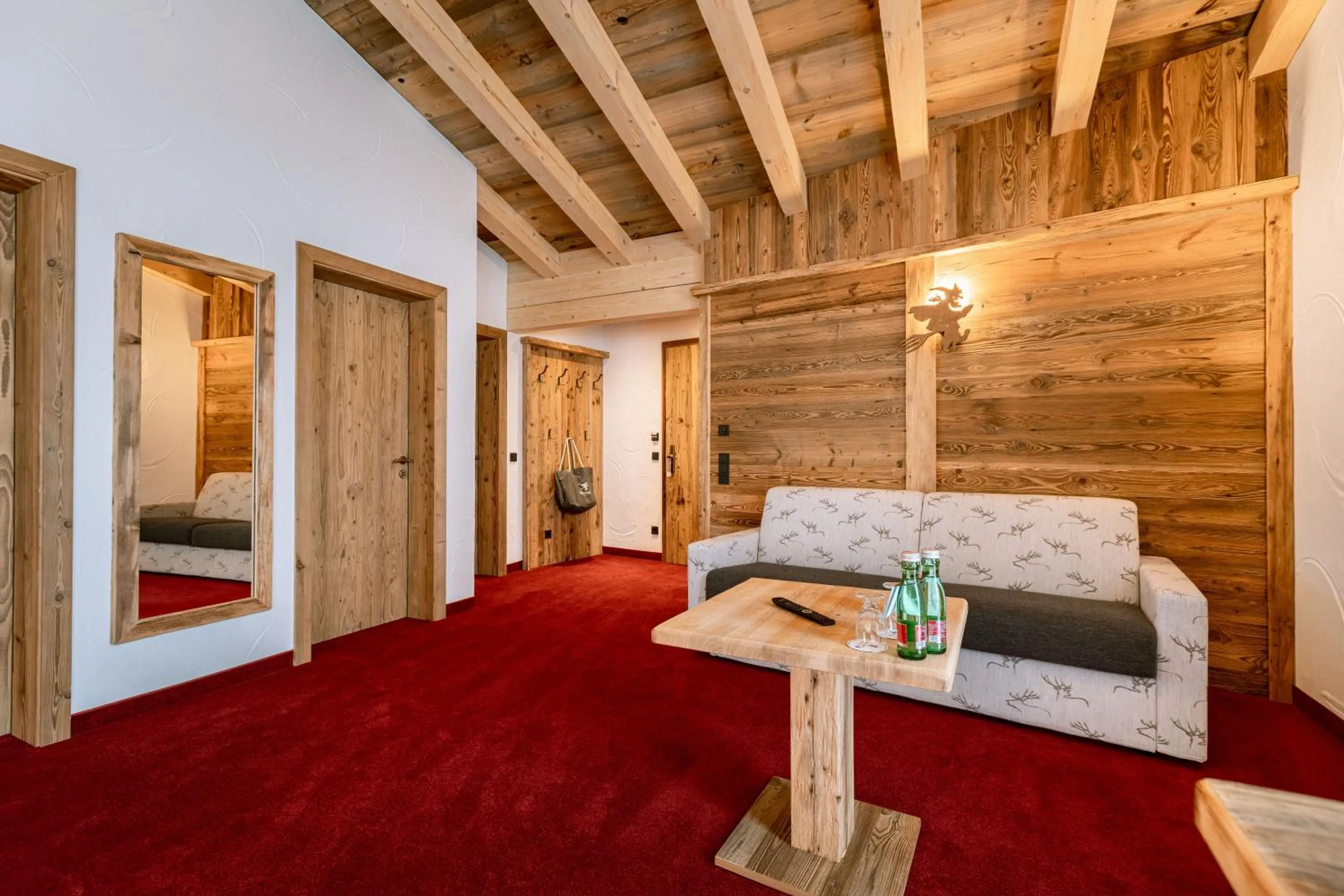 Living room, Bed in Hotel Restaurant Hexenalm