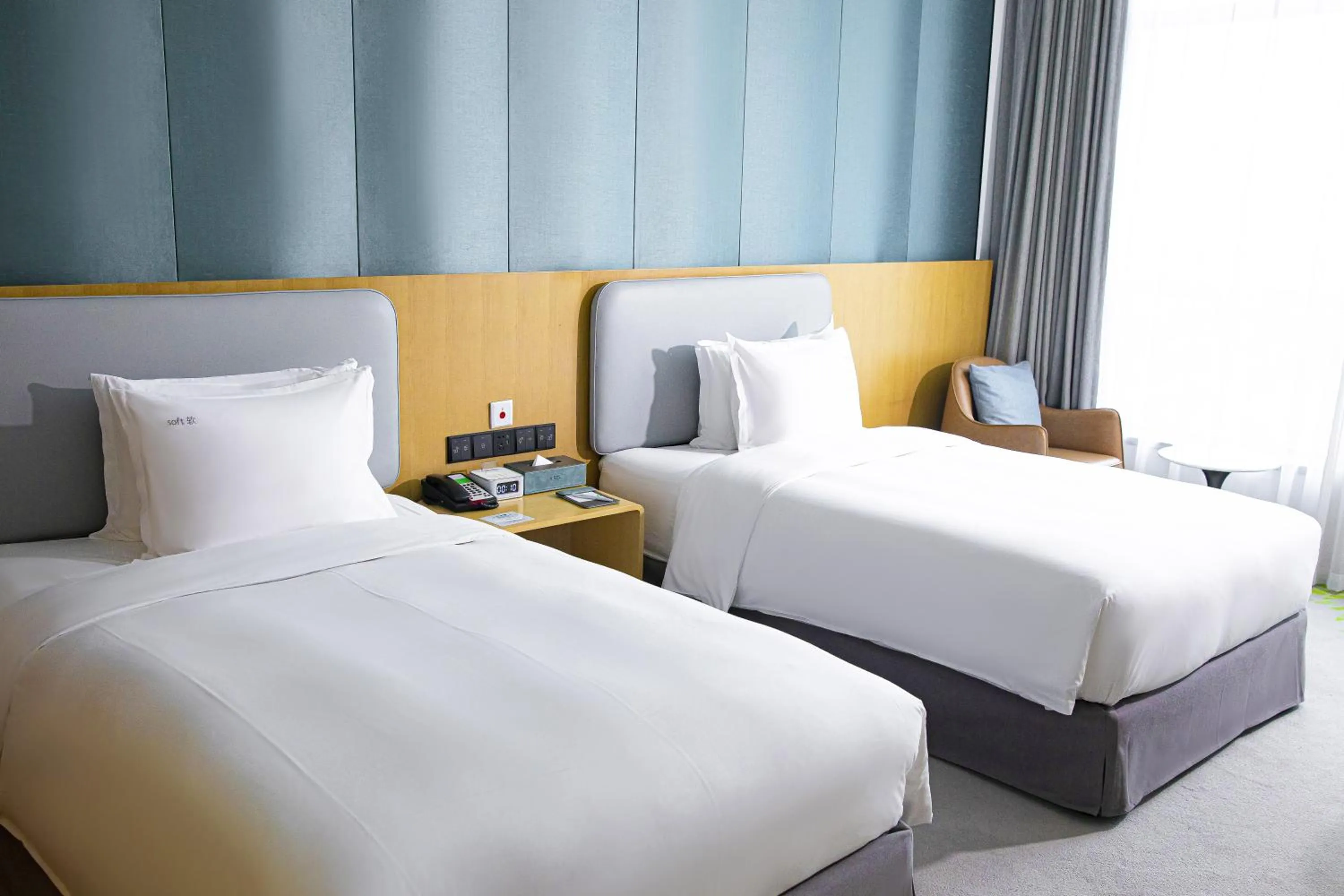 Bed in Holiday Inn Fuyang by IHG
