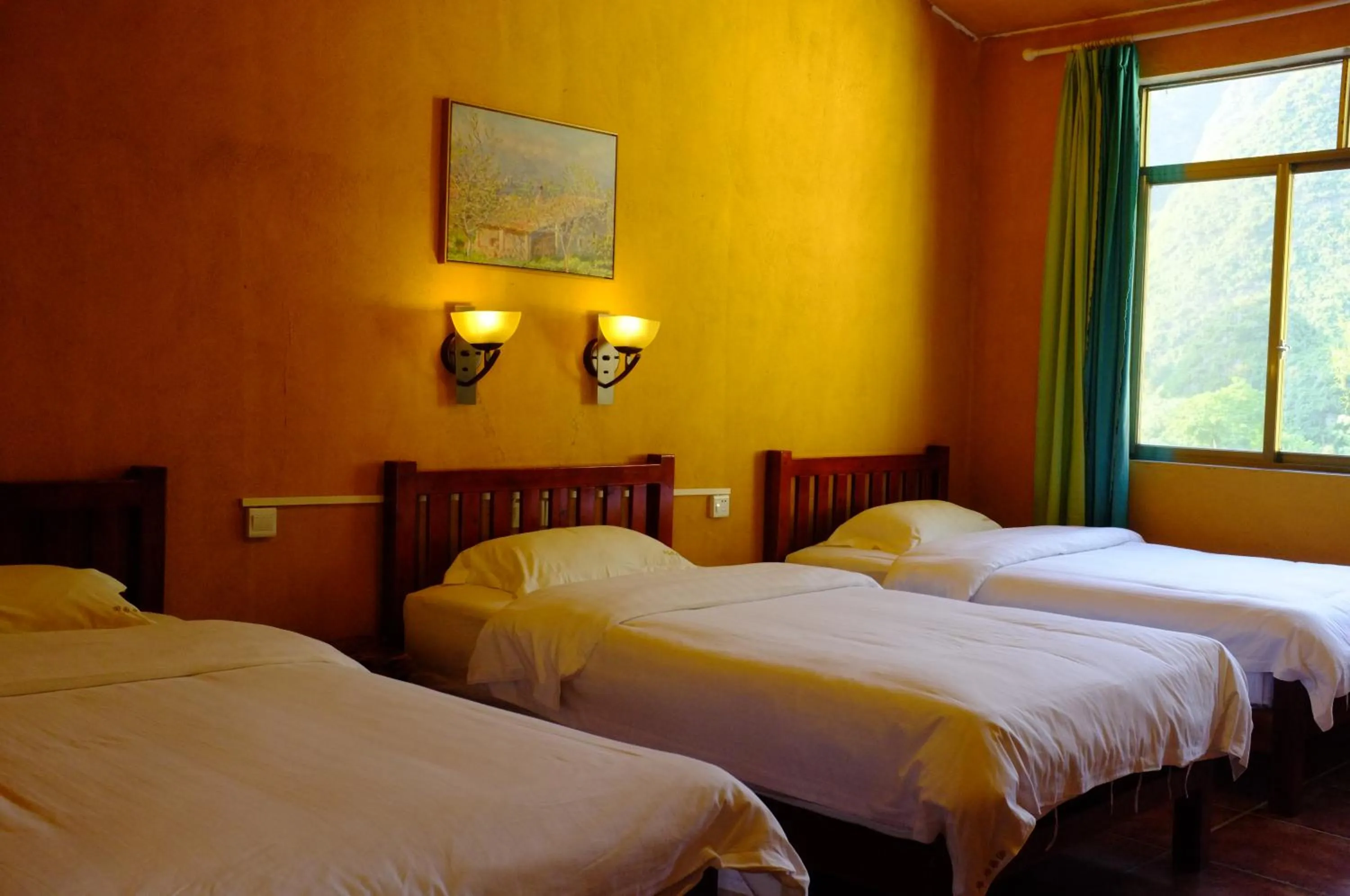 Photo of the whole room, Bed in YangShuo Eden Inn