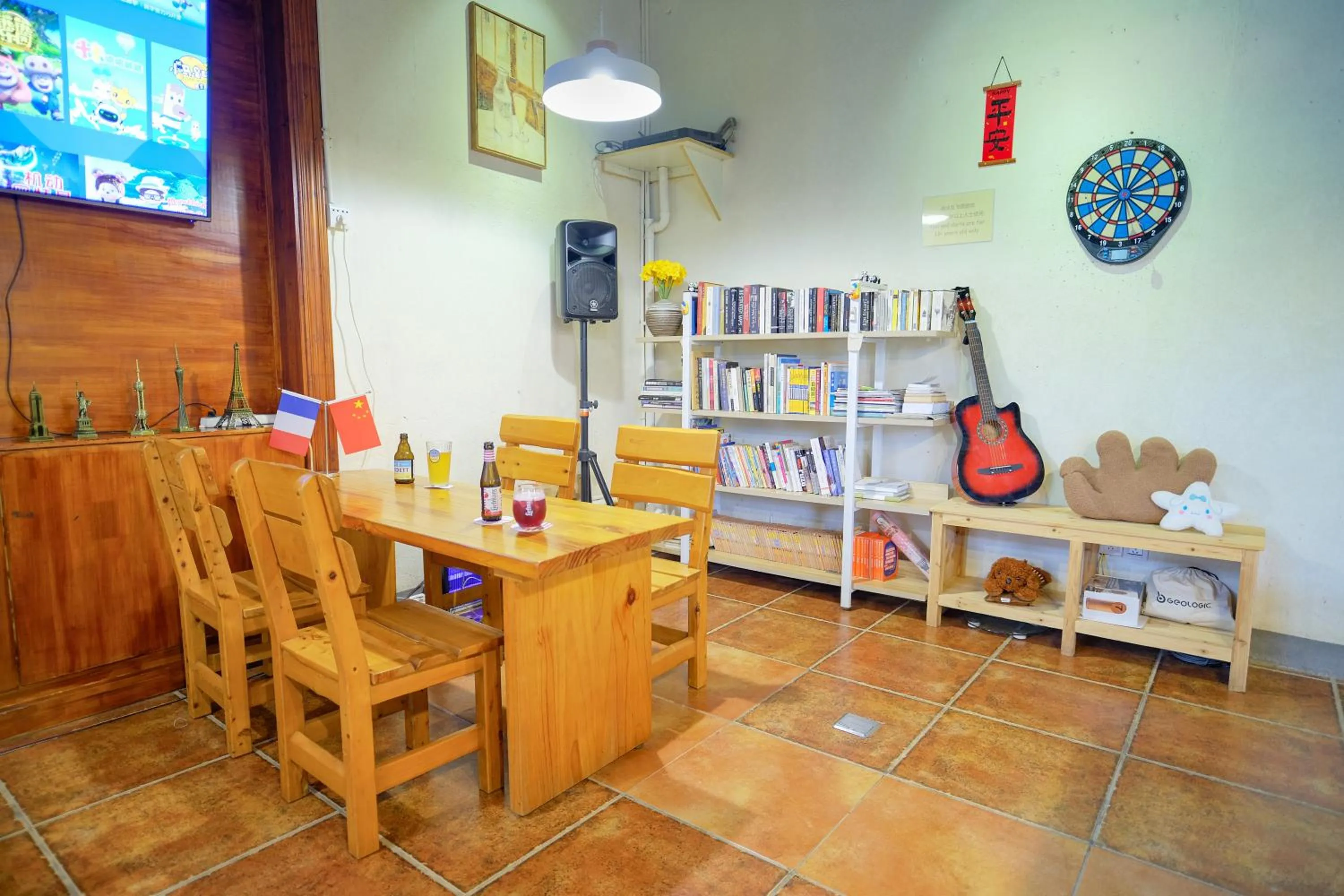 Communal lounge/ TV room in YangShuo Eden Inn