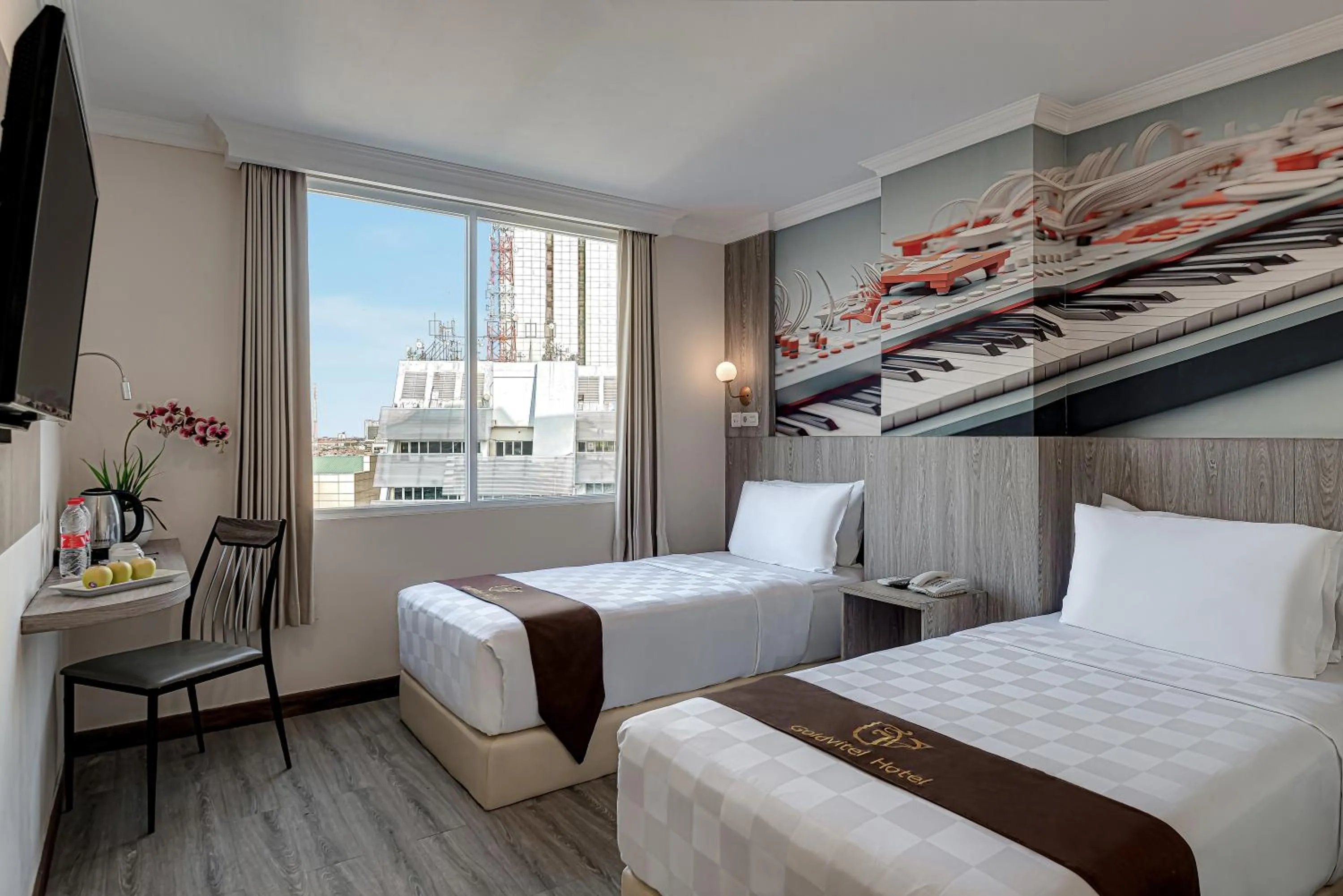 Bed in Goldvitel Hotel Surabaya