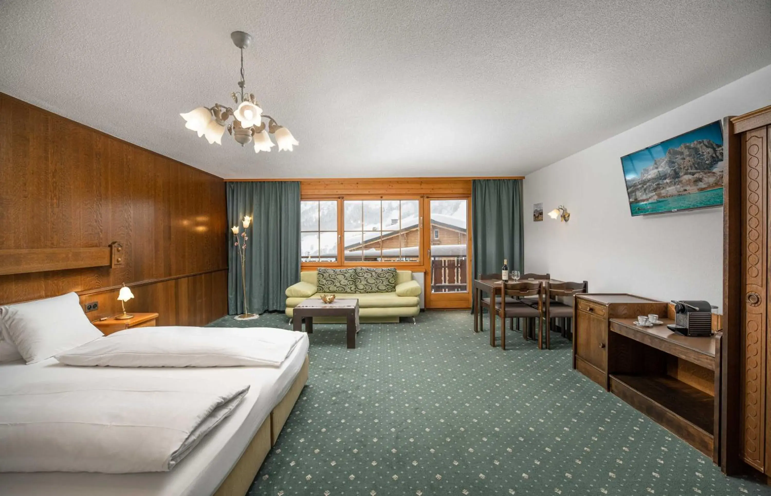 Photo of the whole room, Bed in Grichting Hotel & Serviced Apartments Photo of the whole room, Bed in Grichting Hotel & Serviced Apartments