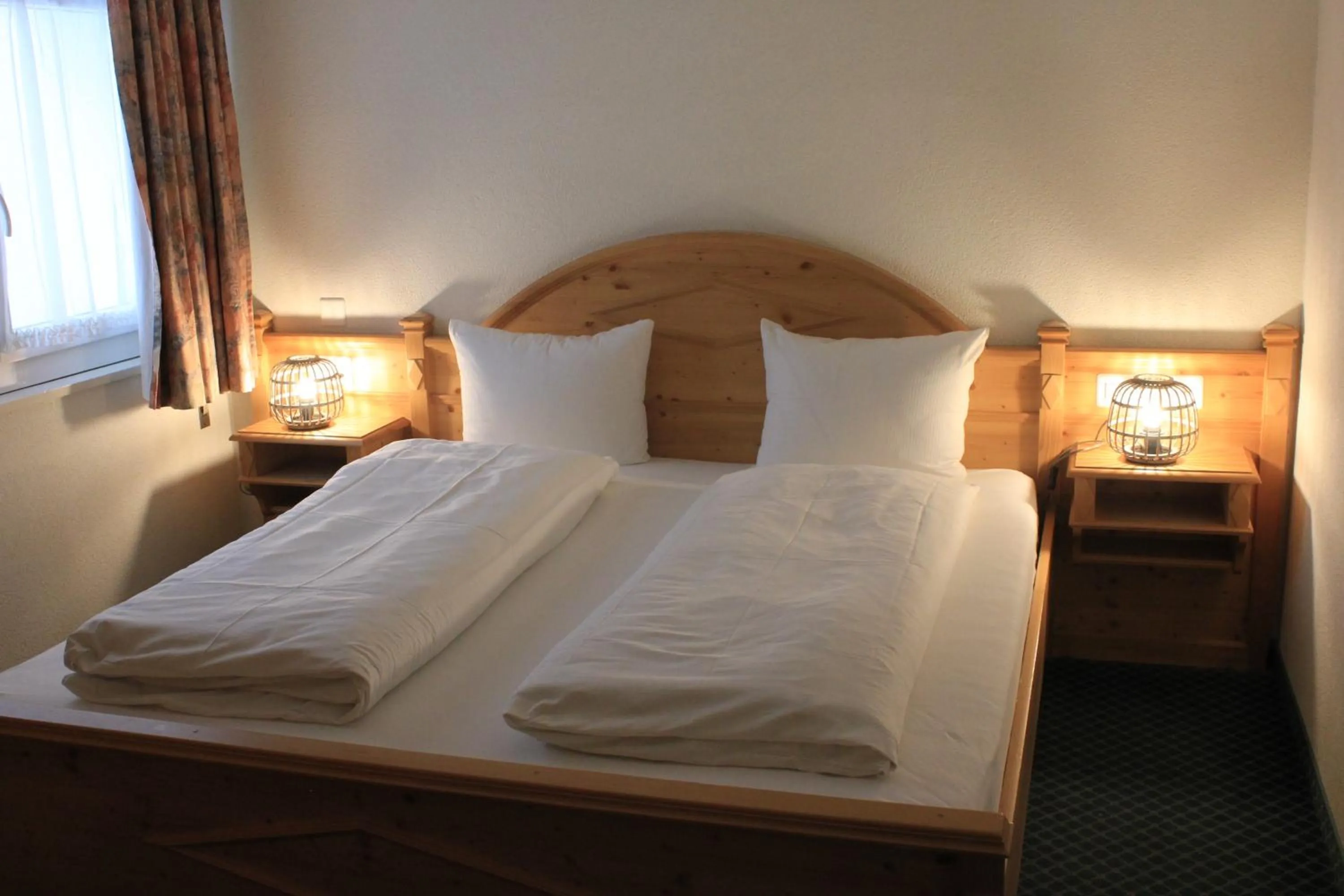 Bed in Grichting Hotel & Serviced Apartments