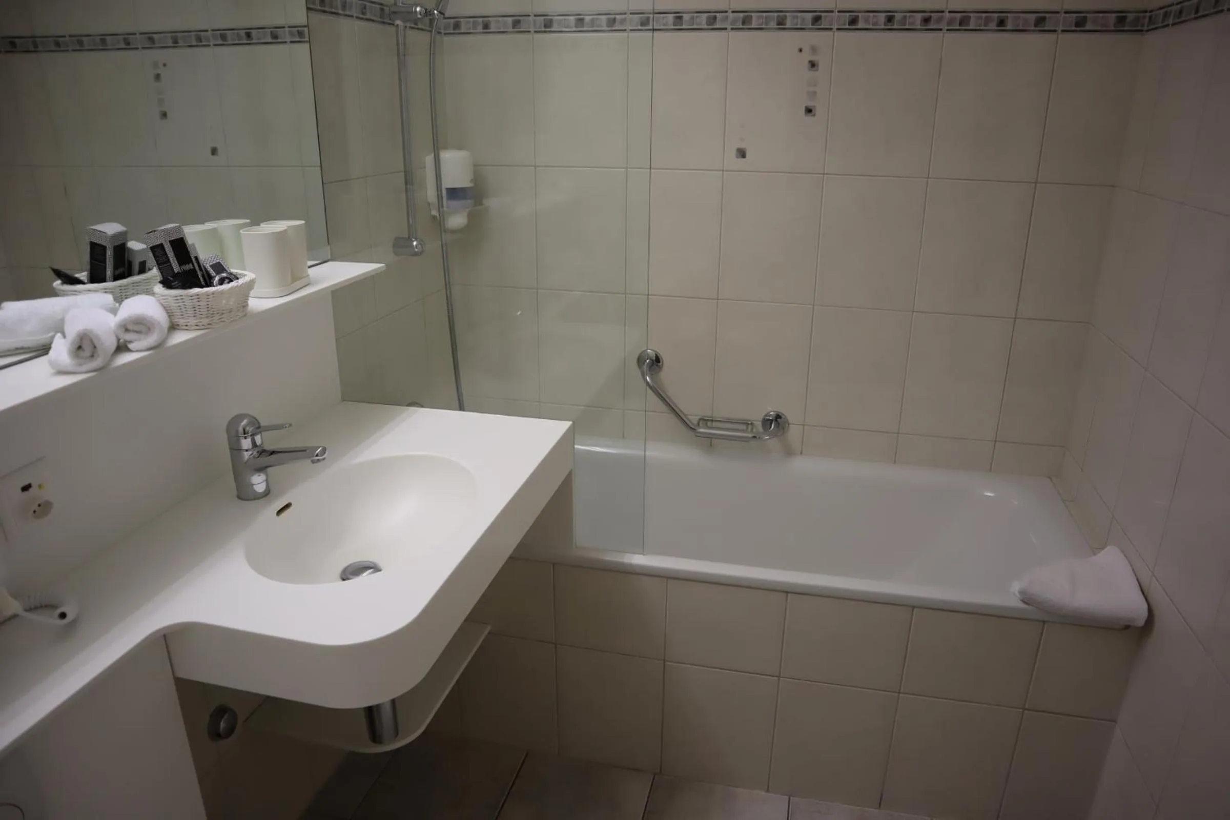 Shower in Grichting Hotel & Serviced Apartments